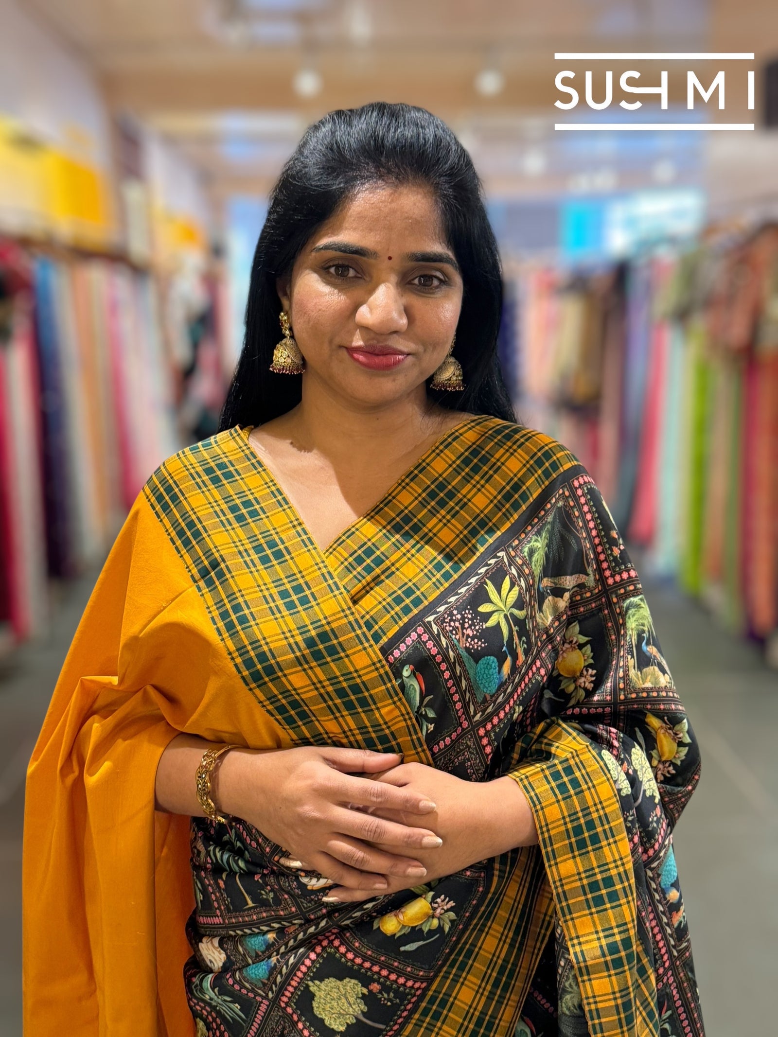 Black printed soft silk saree with burberry checks border : D62F033