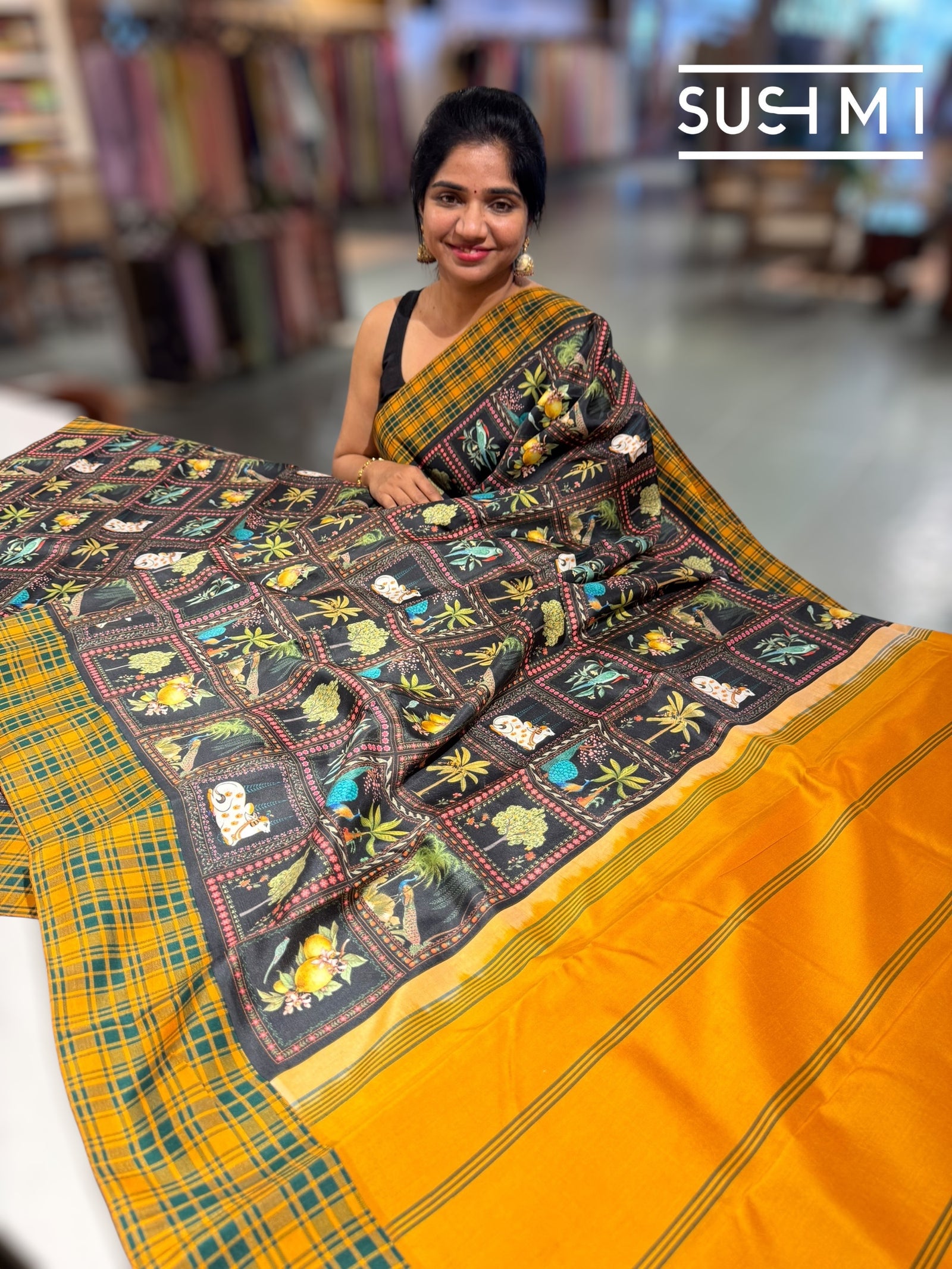 Black printed soft silk saree with burberry checks border : D62F033