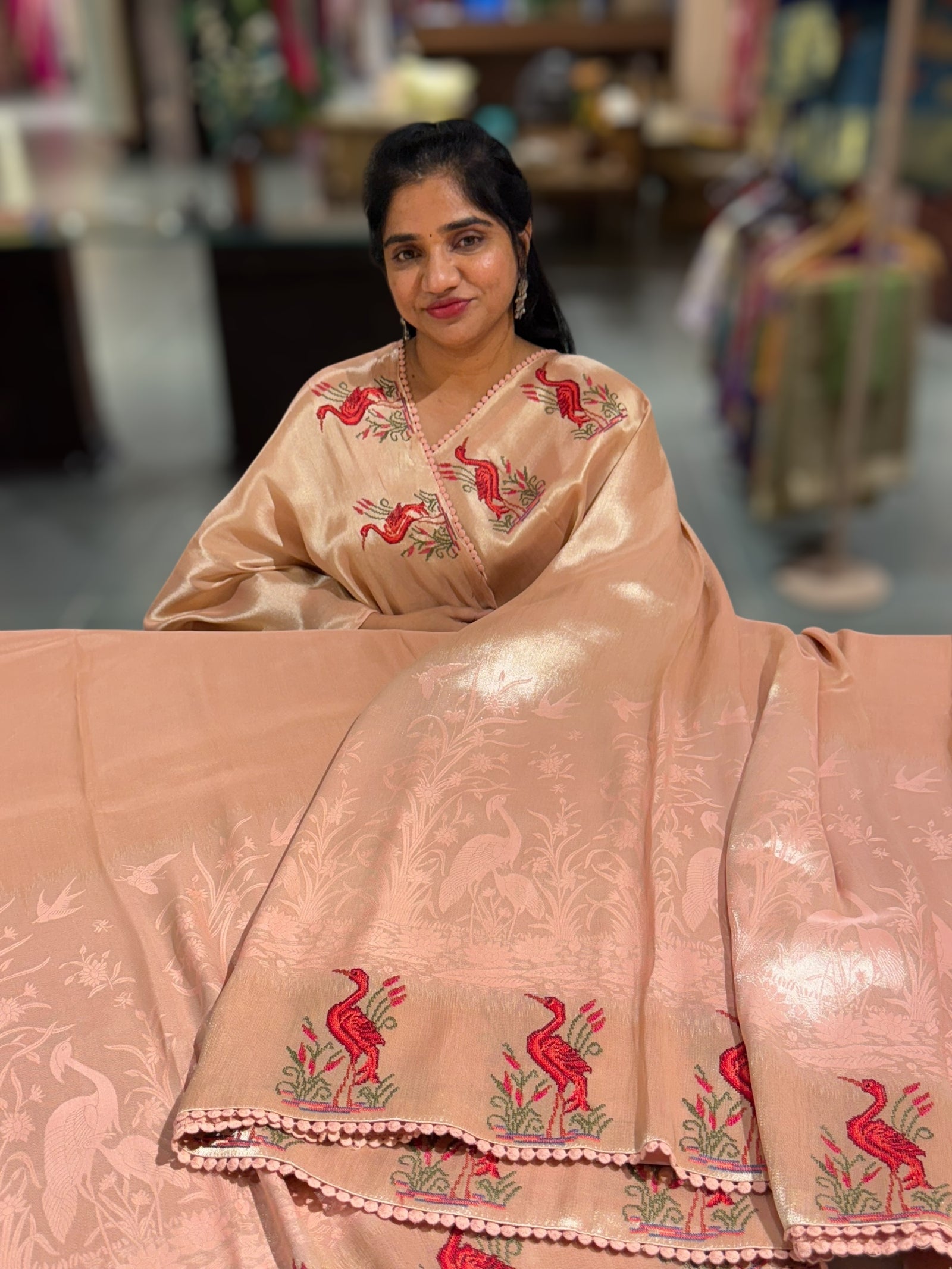 Peach Pink Banarasi Brocade tissue saree with tonchui style weaving & petite point embroidered swan border