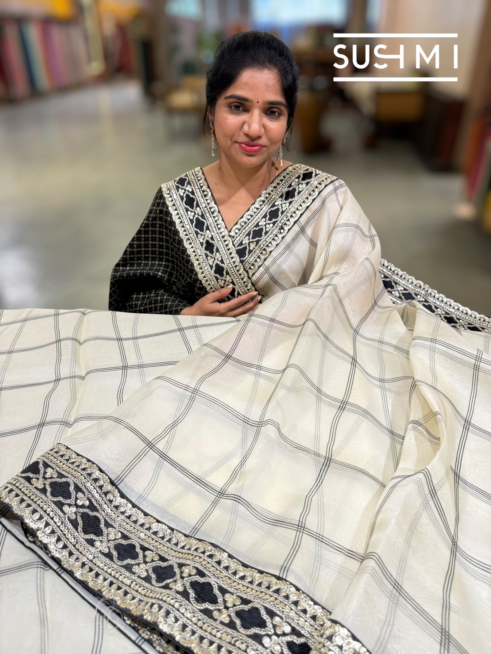 Ivory checks Organza with Sabhya inspired borders : S62F068