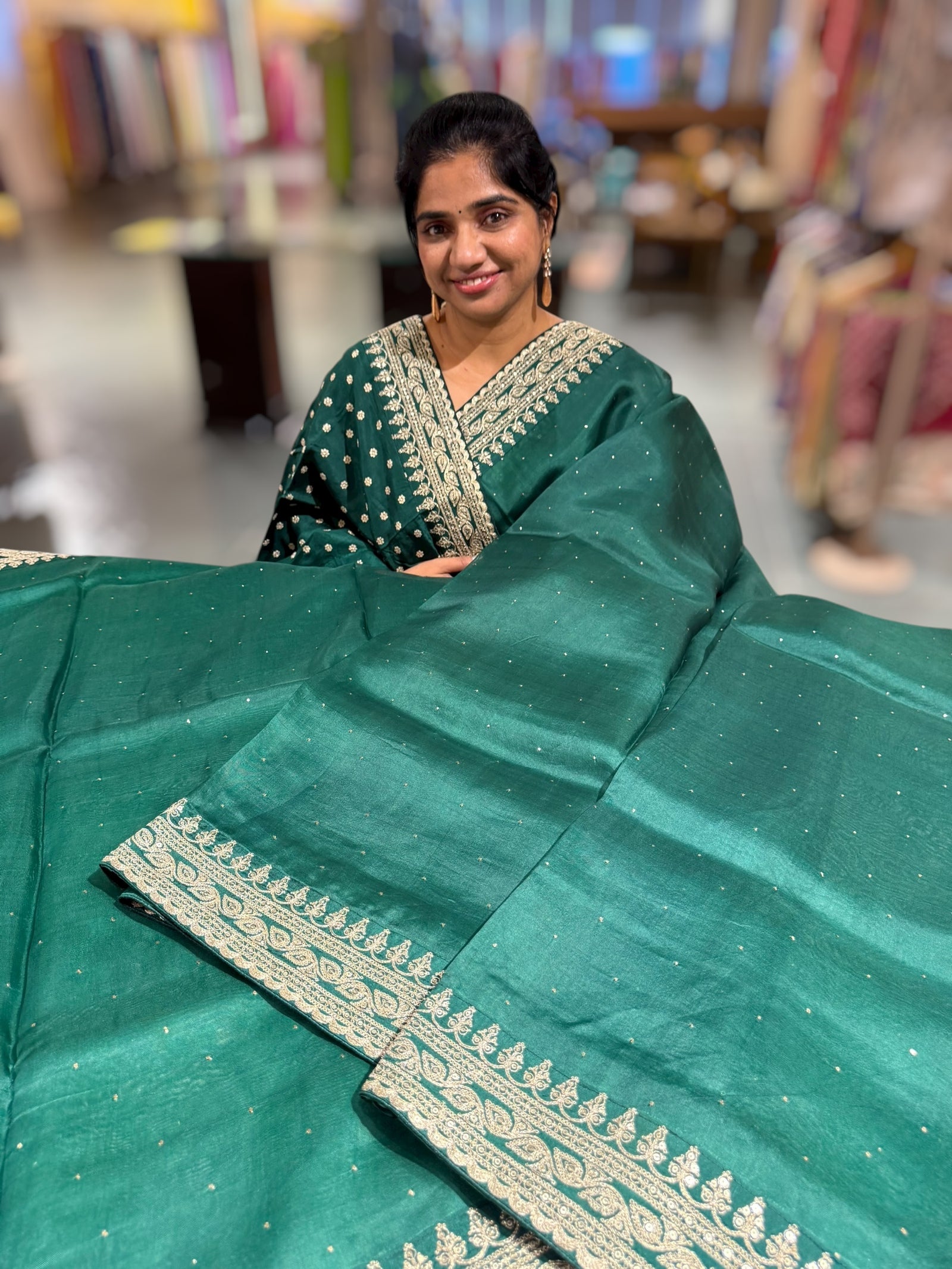 Emerald Green Pure Organza Saree with allover mukaish work & sabyasachi borders