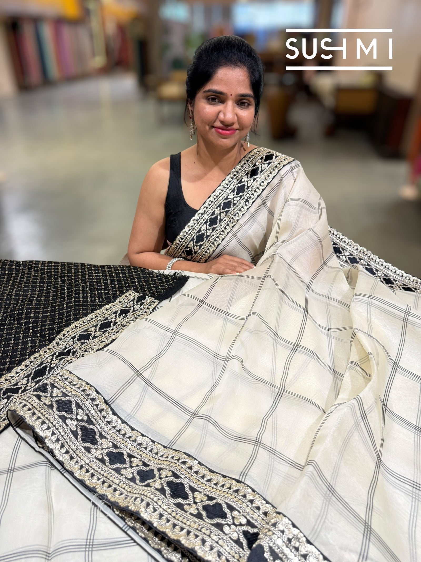 Ivory checks Organza with Sabhya inspired borders : S62F068