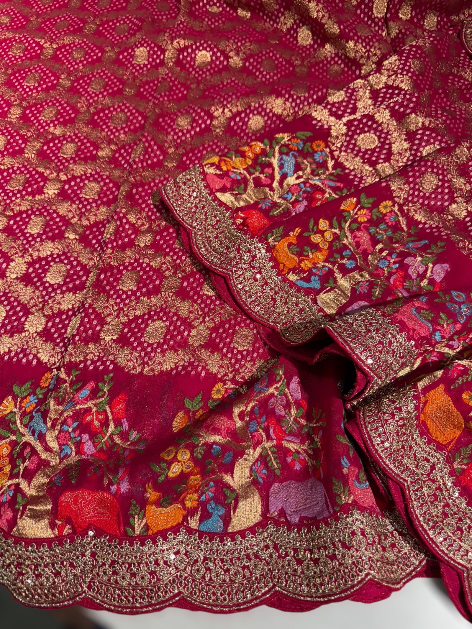 Reddish pink Bandhini Georgette Saree with sabya style scallop border