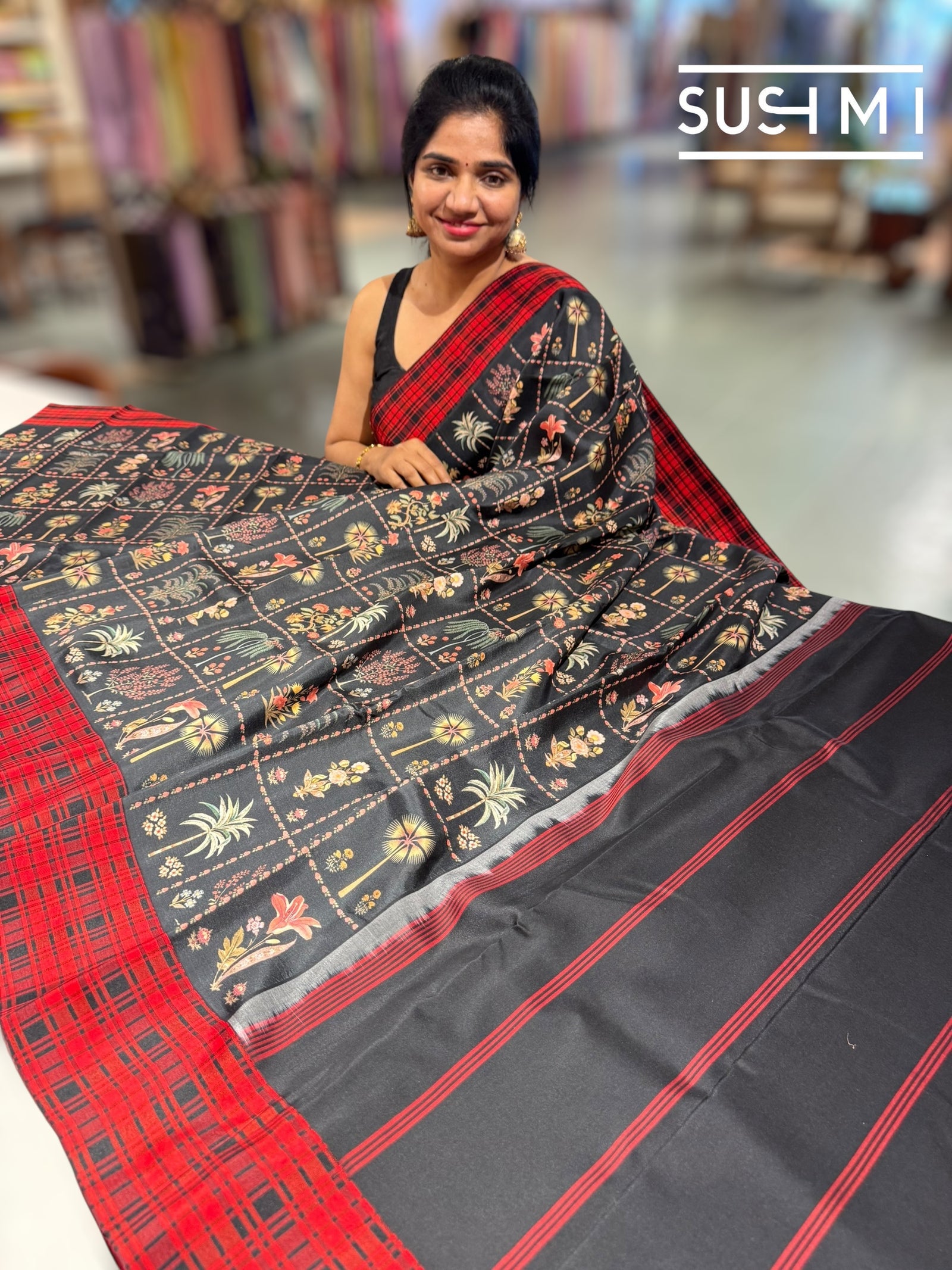 Black printed soft silk saree with burberry checks border : D62F035