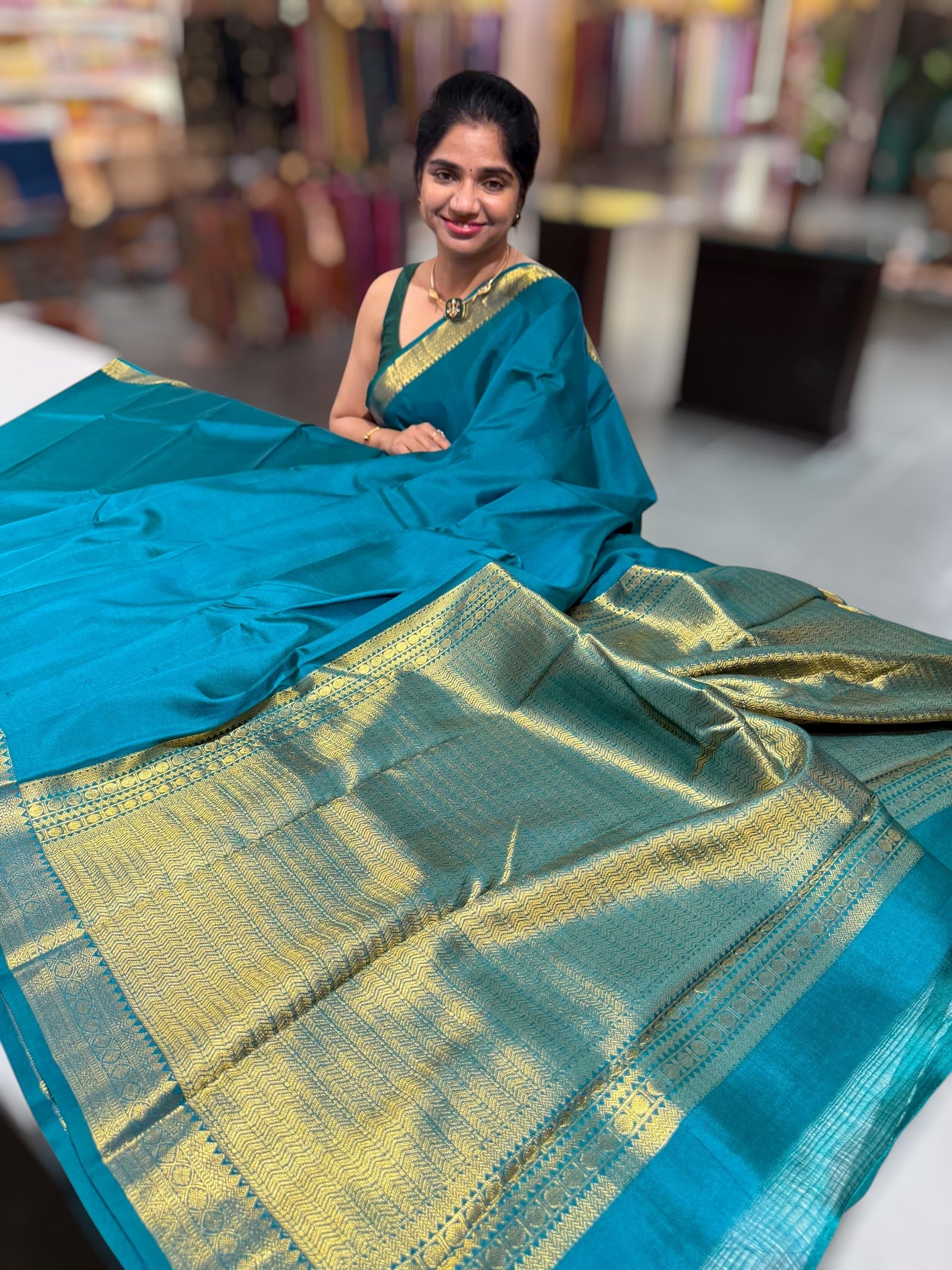 Peacock Green vintage Kanchipuram silk saree with pen kalamkari blouse
