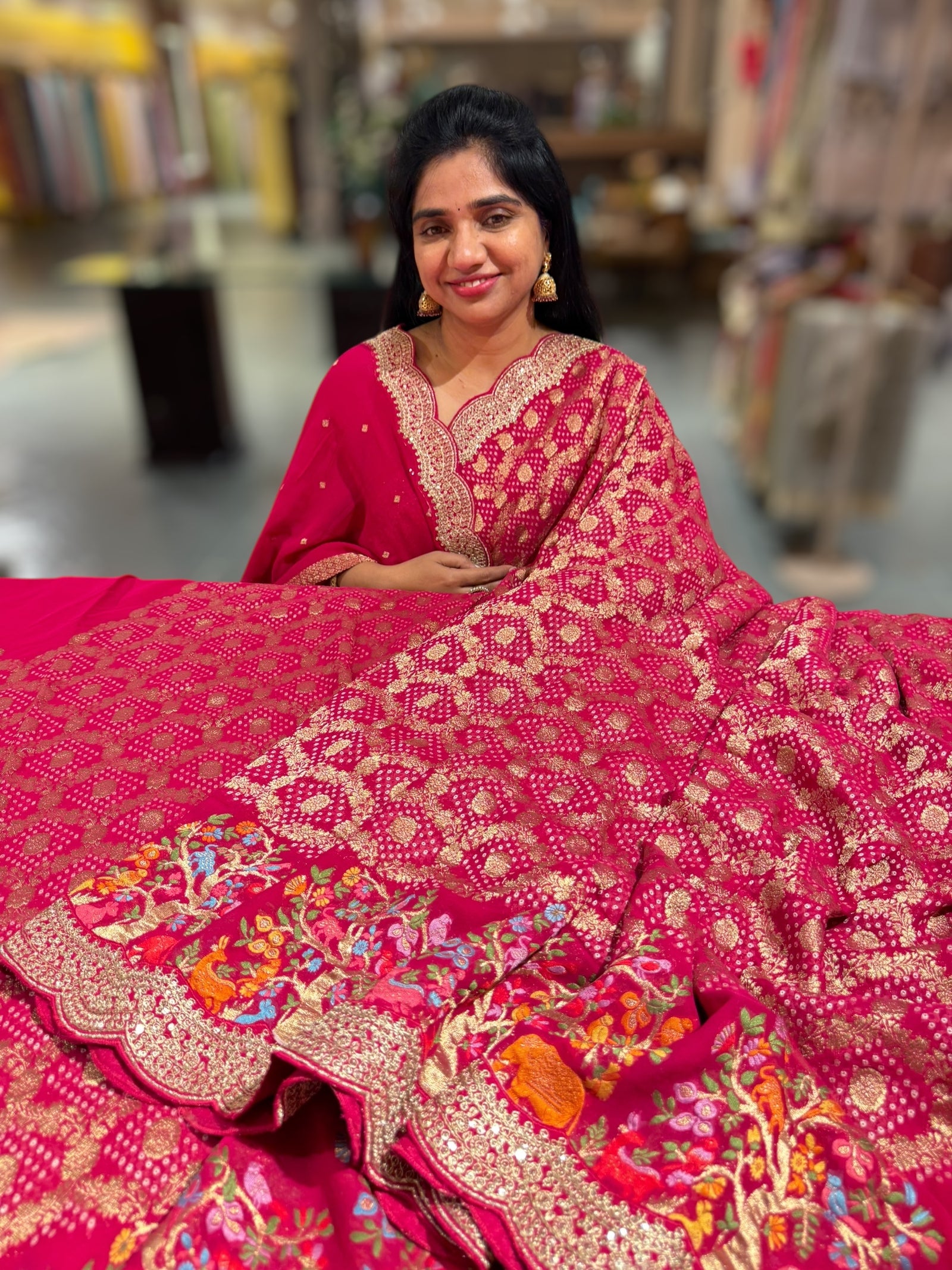 Reddish pink Bandhini Georgette Saree with sabya style scallop border