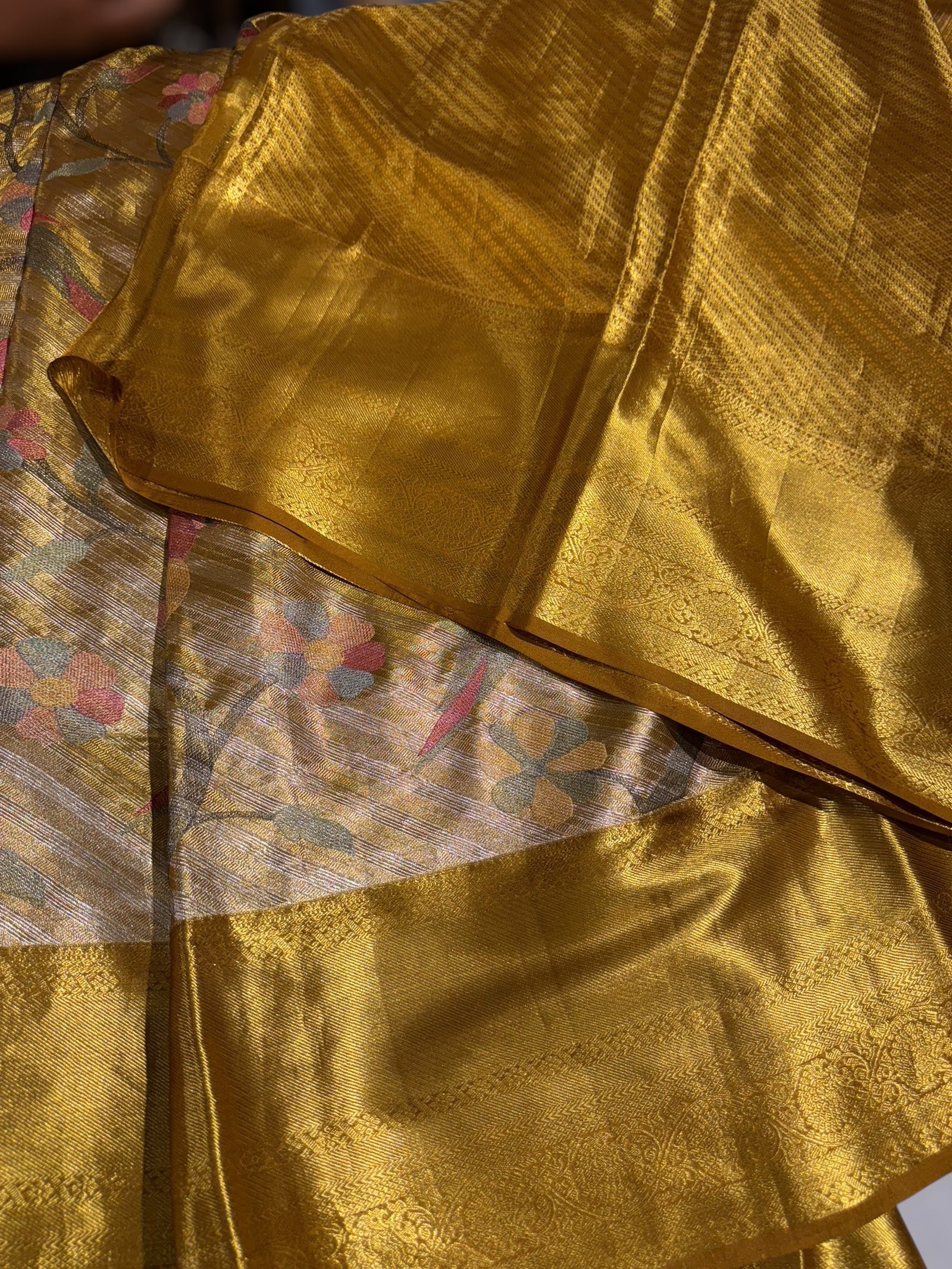 Molten Gold Kanjeevaram Tissue Saree with allover embroidery