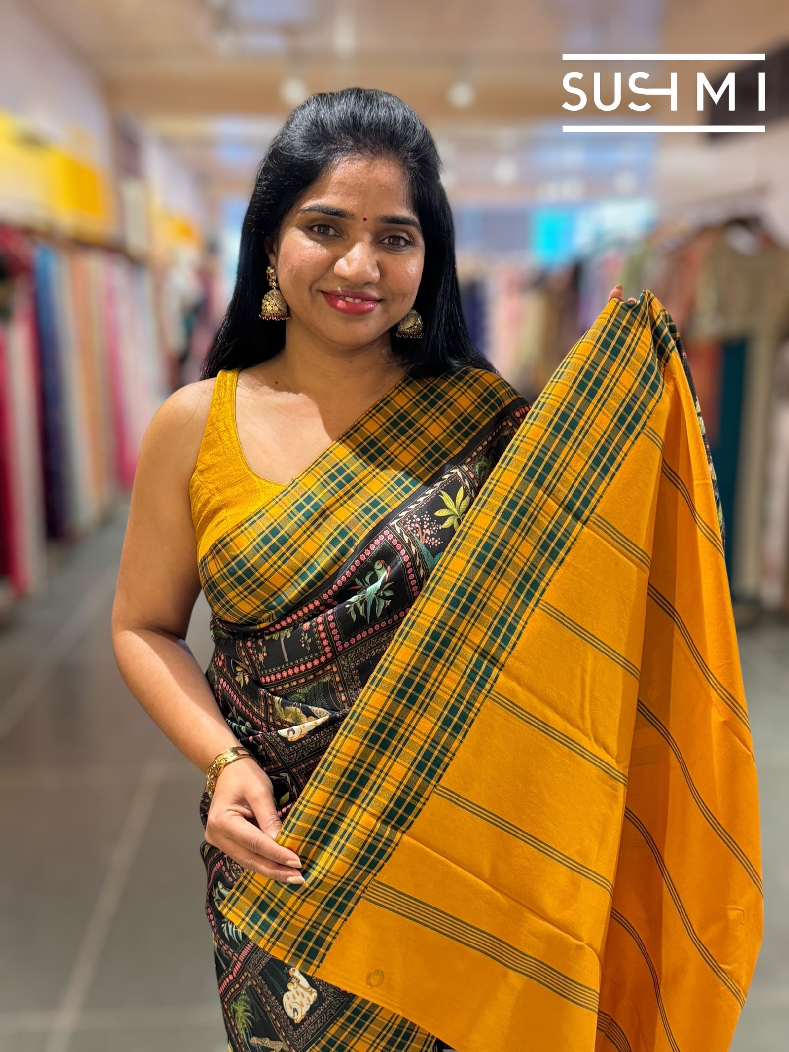 Black printed soft silk saree with burberry checks border : D62F033