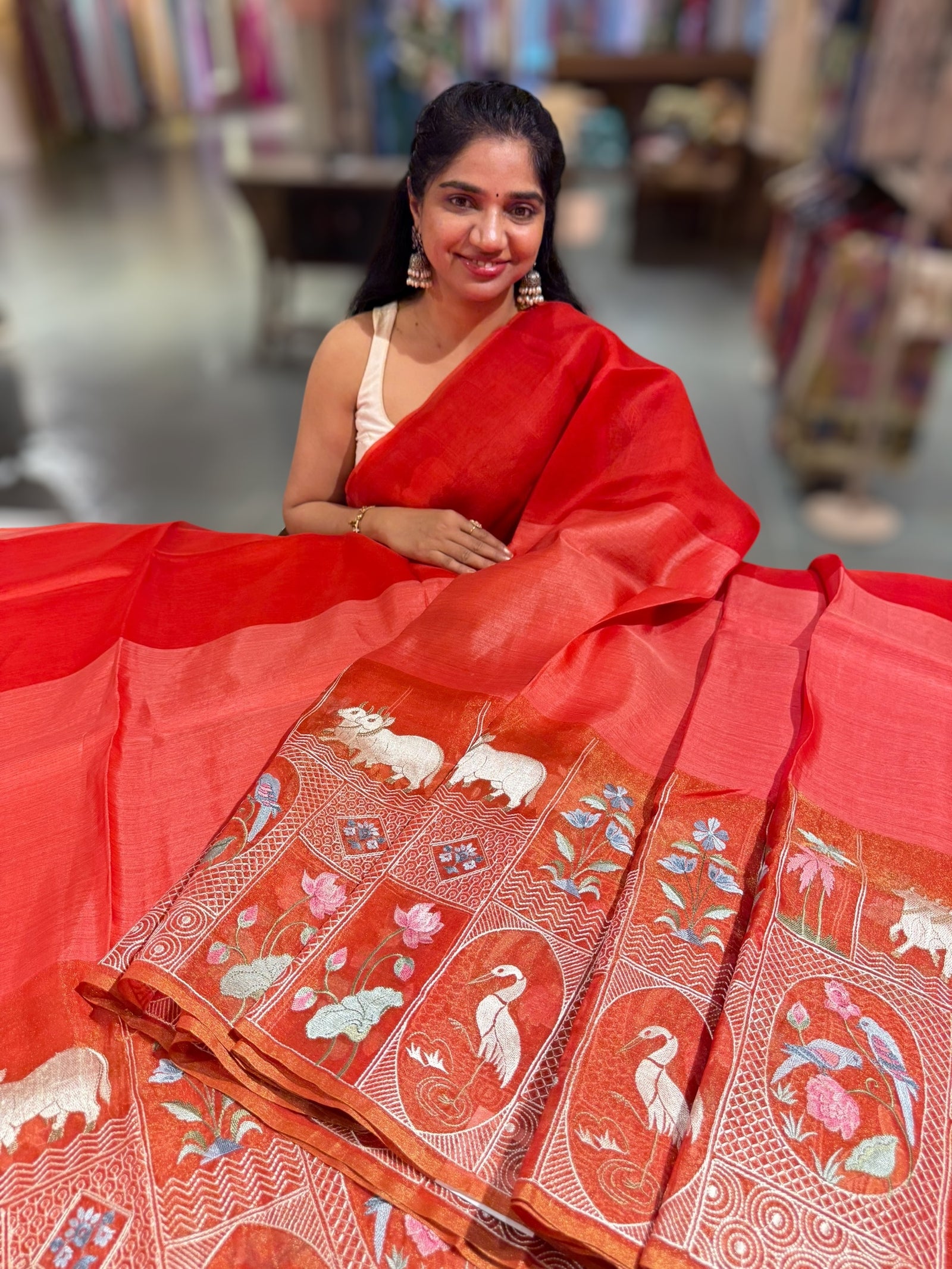 Reddish Orange Kora-Tussar blend Handloom Saree with Tissue embroidered Skirt Border