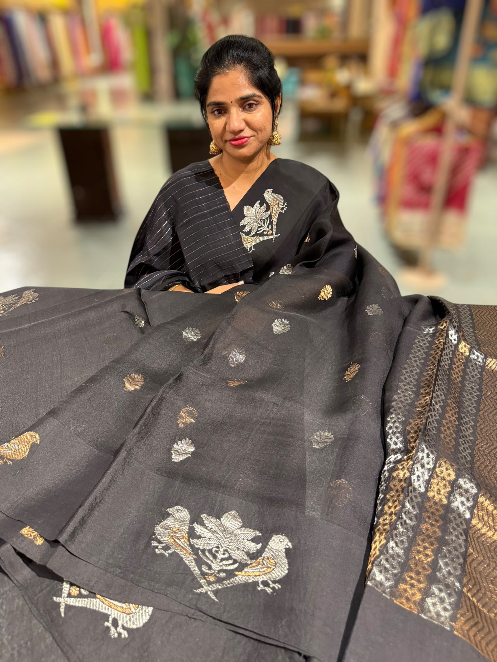 Black kora muslin sarees with kaduwa woven nandi motif border