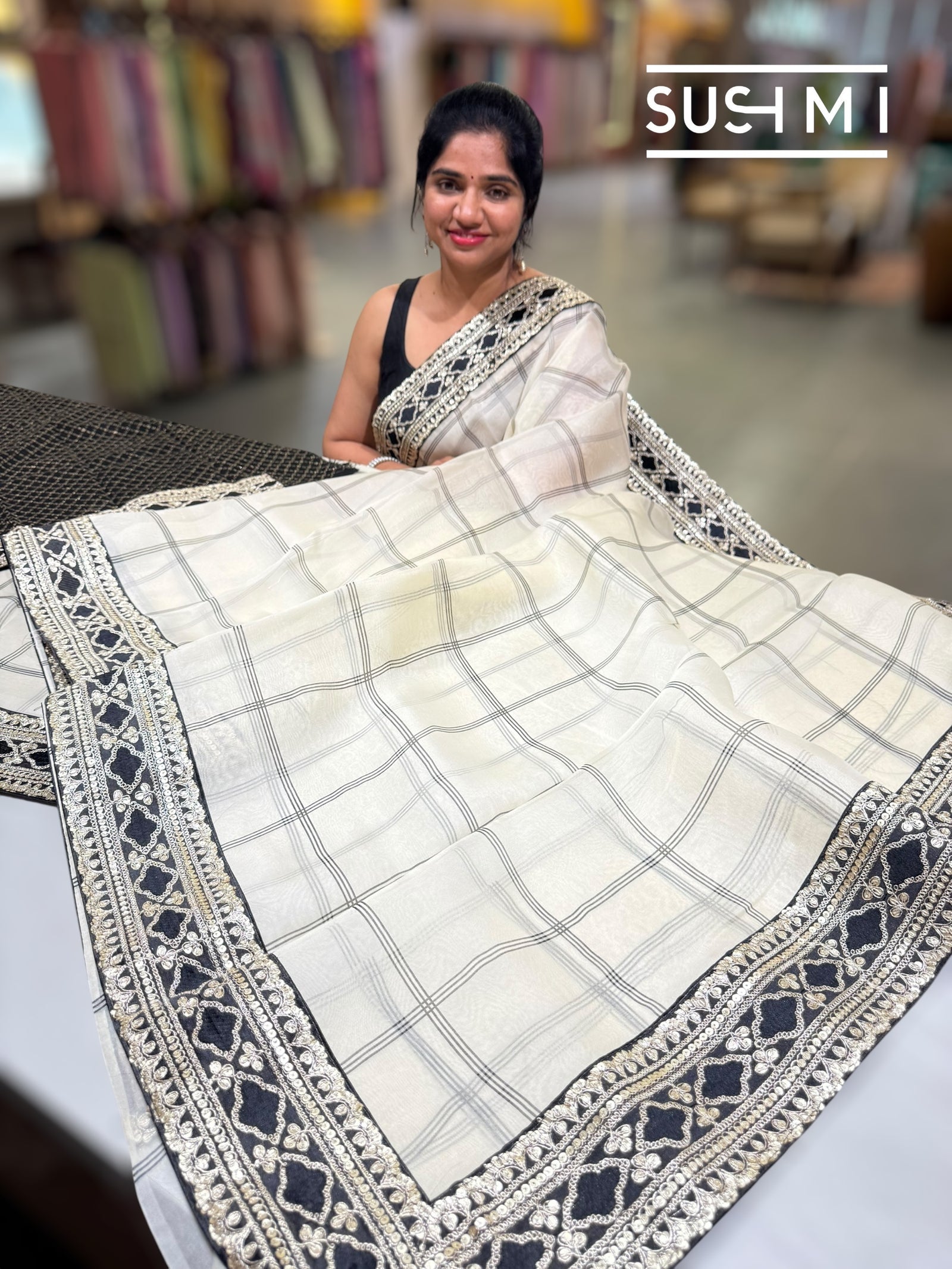 Ivory checks Organza with Sabhya inspired borders : S62F068