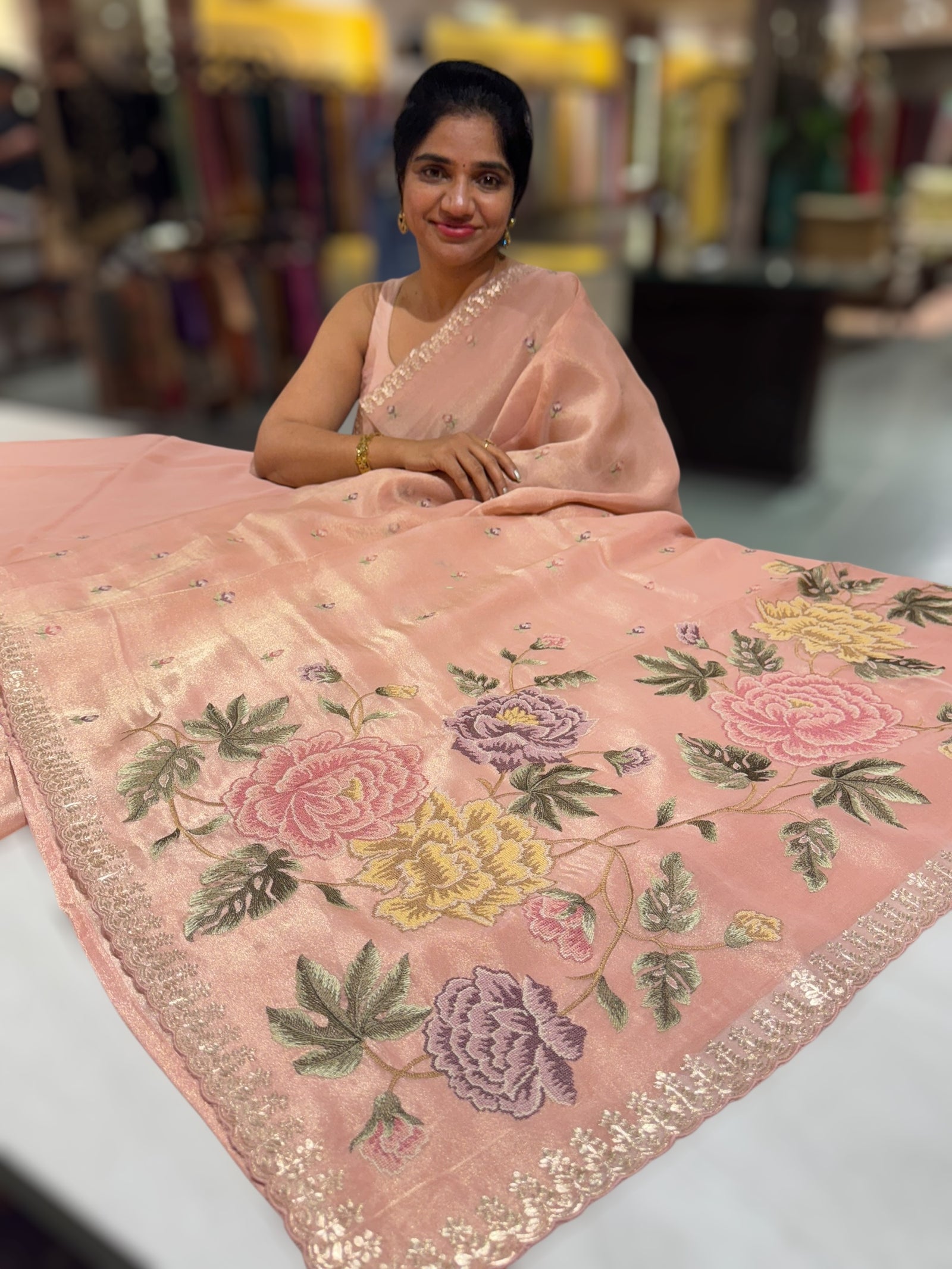 Peach Pink Tissue Georgette Saree with petite point emb