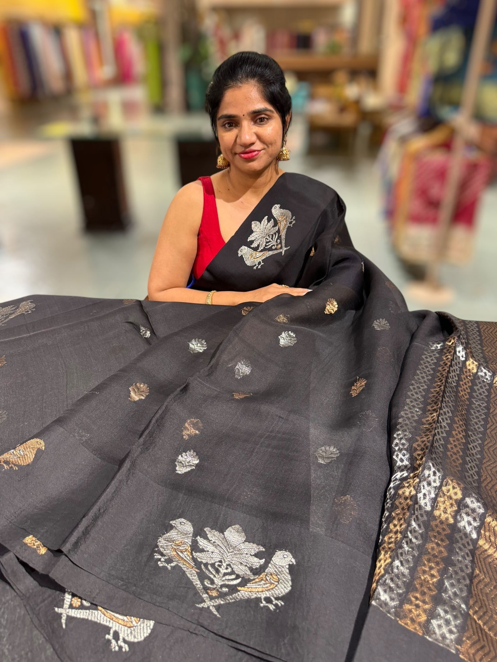 Black kora muslin sarees with kaduwa woven nandi motif border