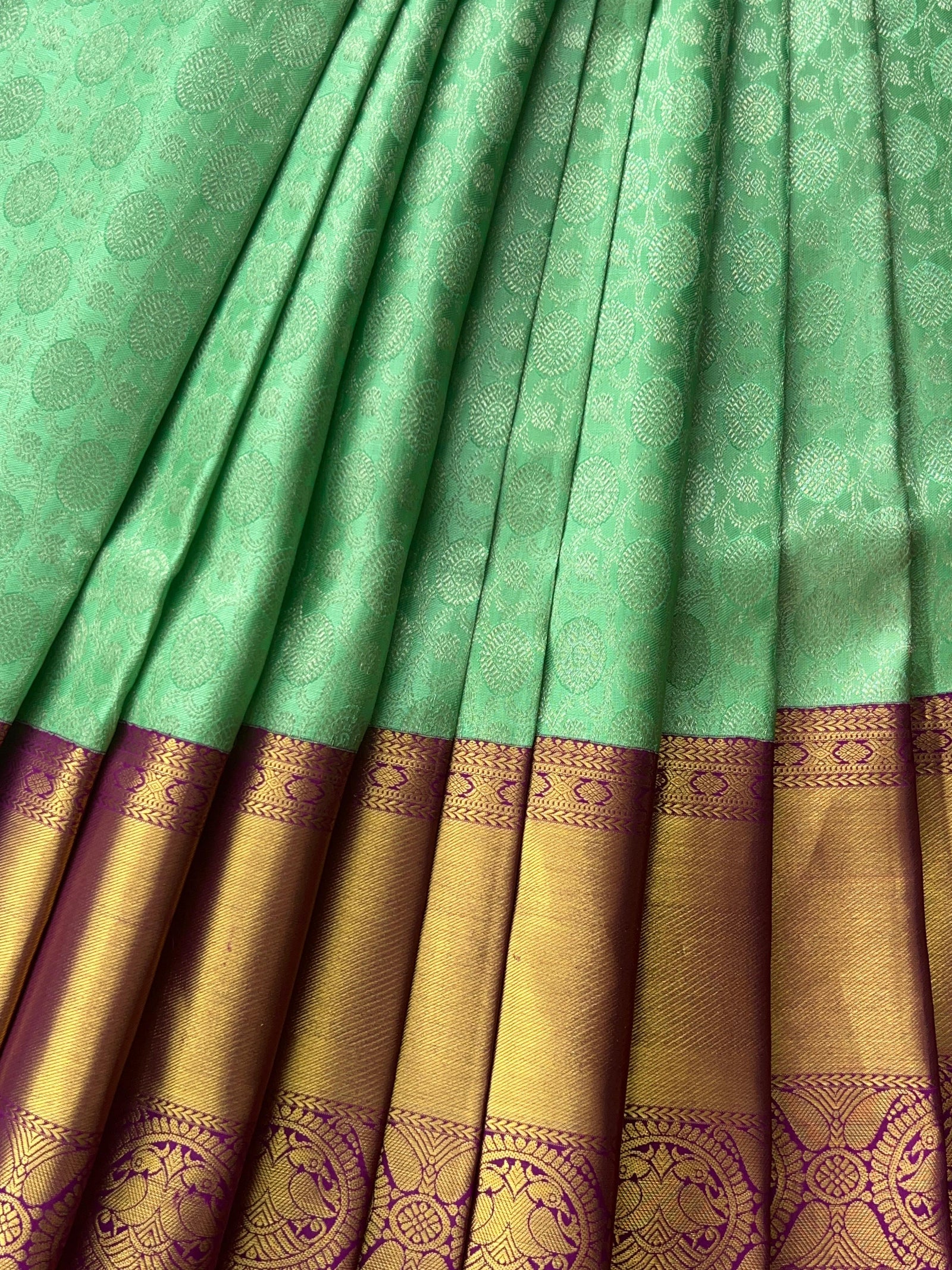 Mint Green Kanchi Pattu Brocade Saree with Rich Purple Zari Border & Pallu