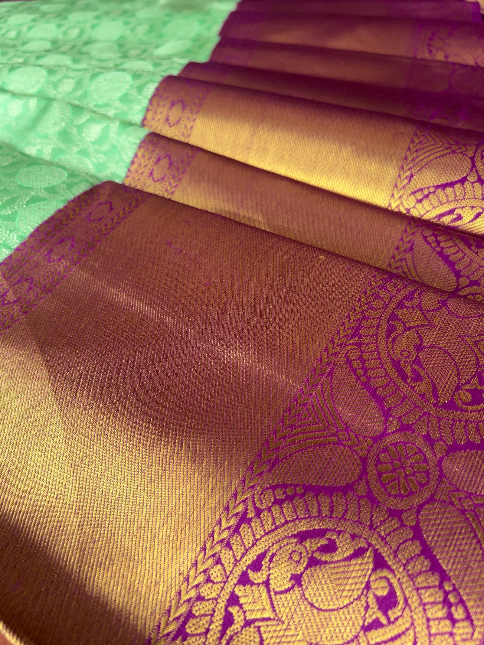 Mint Green Kanchi Pattu Brocade Saree with Rich Purple Zari Border & Pallu