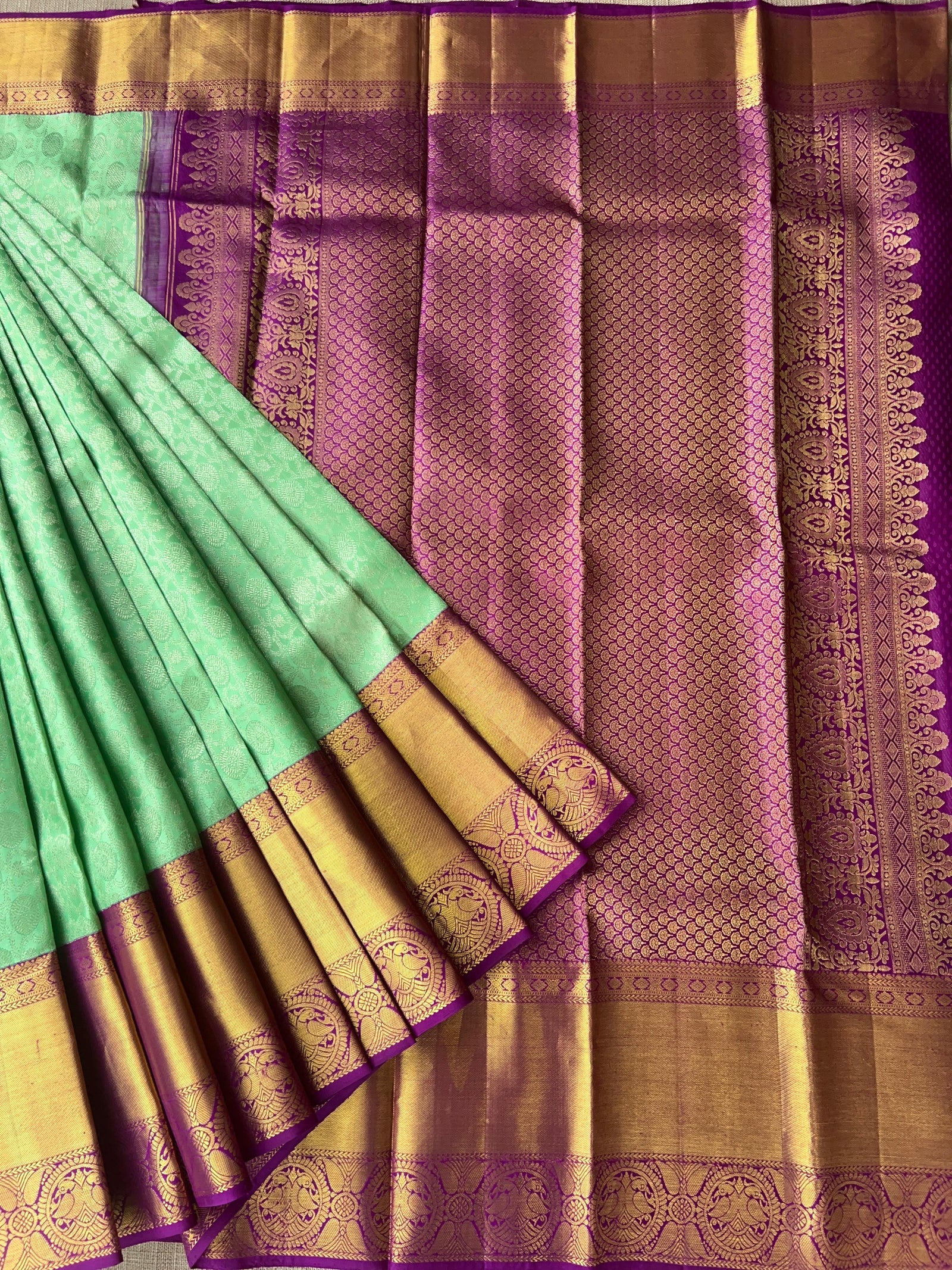 Mint Green Kanchi Pattu Brocade Saree with Rich Purple Zari Border & Pallu