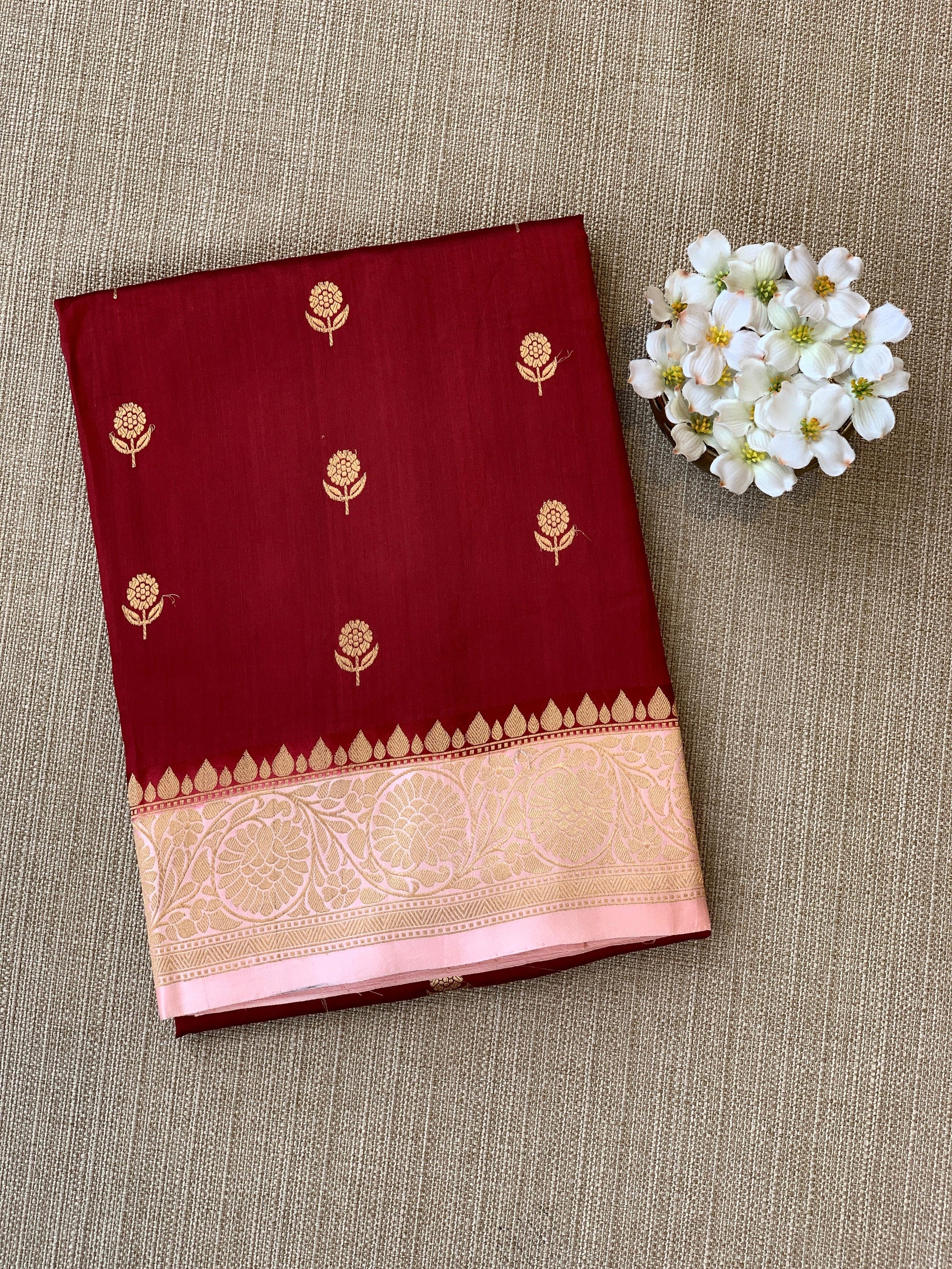 Meroon & Pink Combo Raw Mangoe Silk Saree with kaduwa woven motifs.