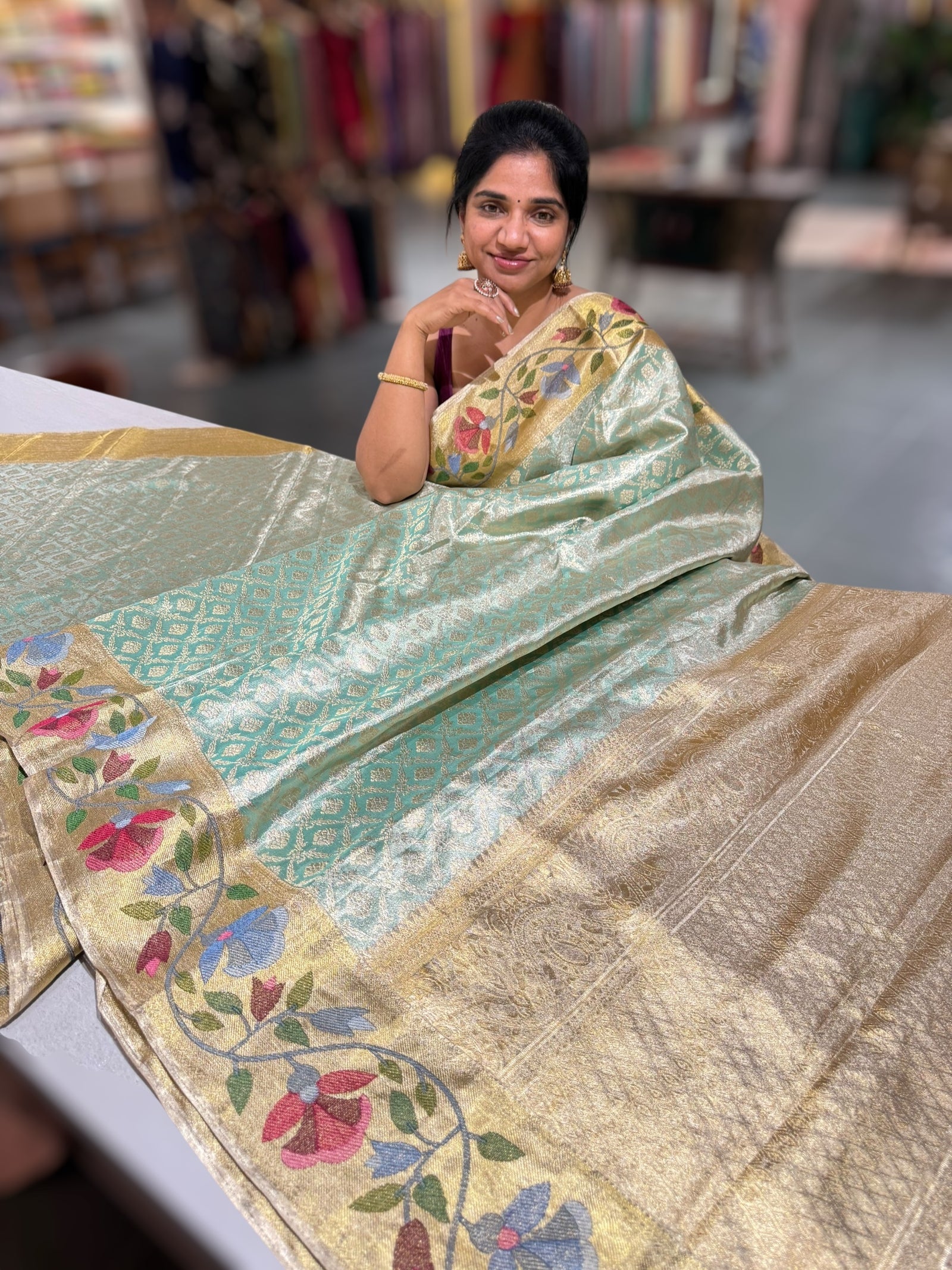 Sea Green Kanchi Tissue Brocade Saree With jamdani inspired embroidery.