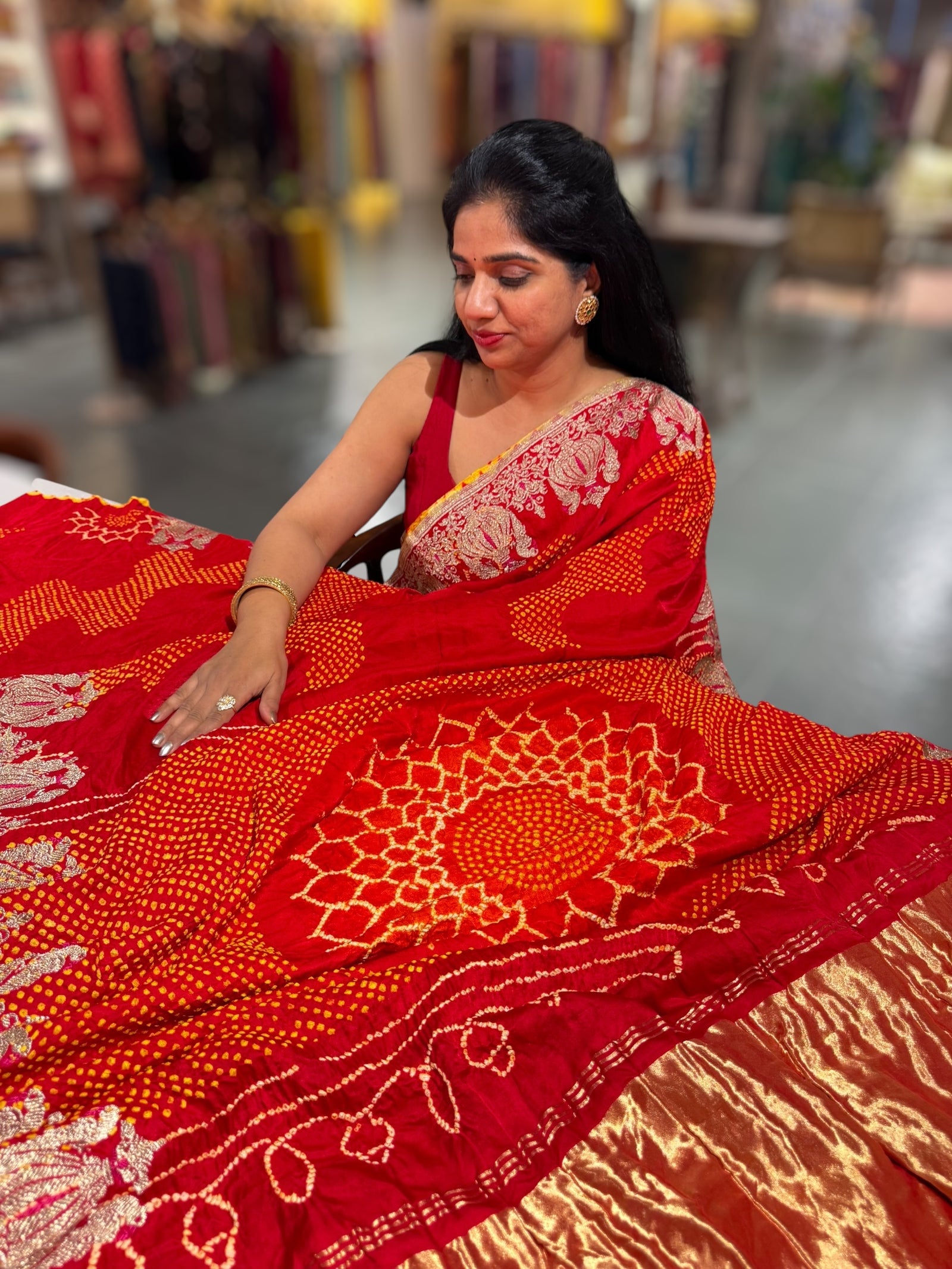 Reddish Orange Designer Rai Bandhej Saree With Embroidered Border