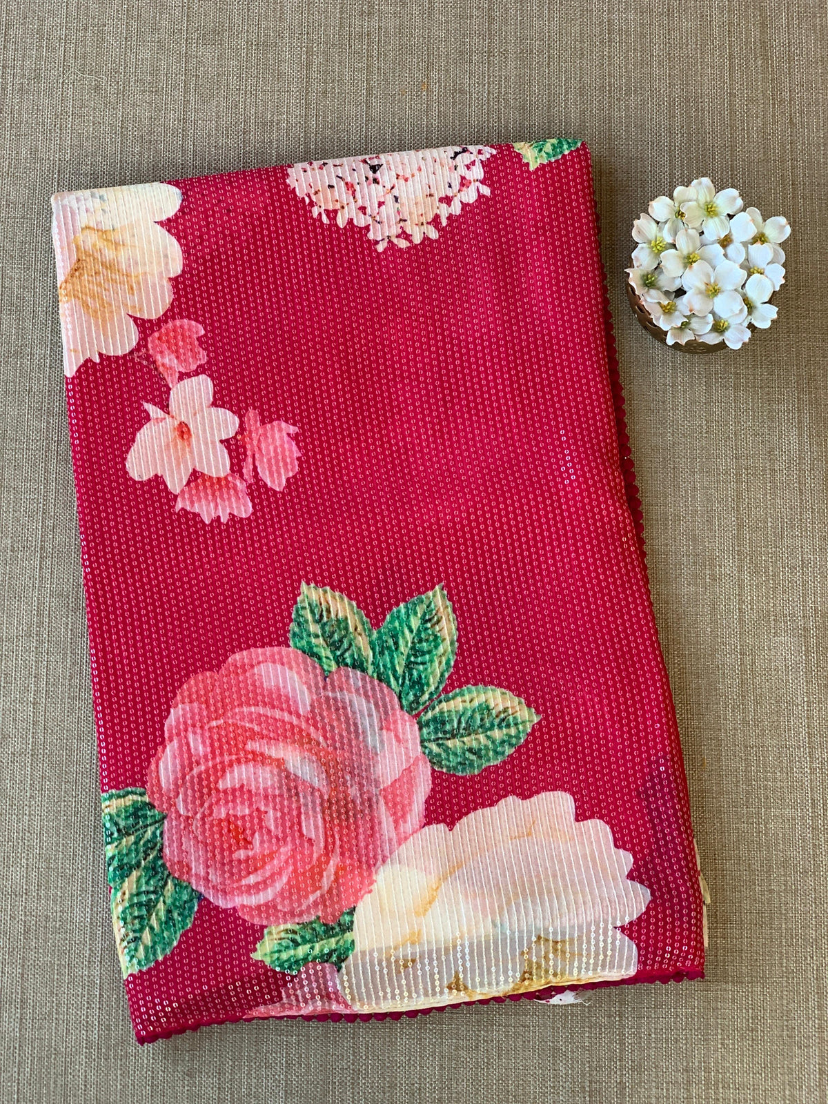 Reddish Pink georgette sequence saree with statement floral print