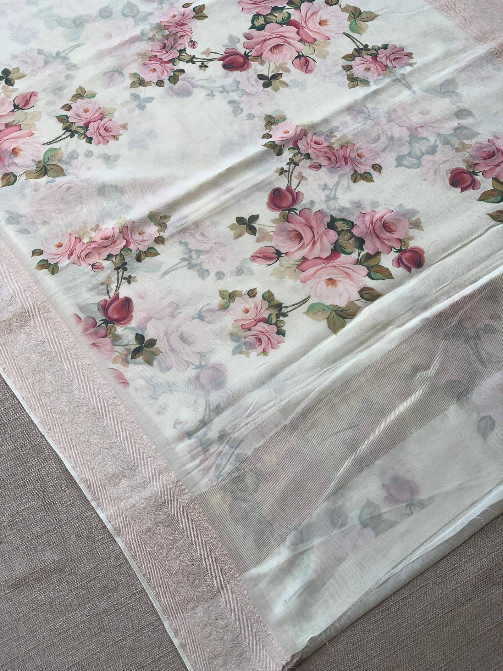 Ivory Pure Handloom Chiniya Silk Saree with stunning Floral Print and zari borders