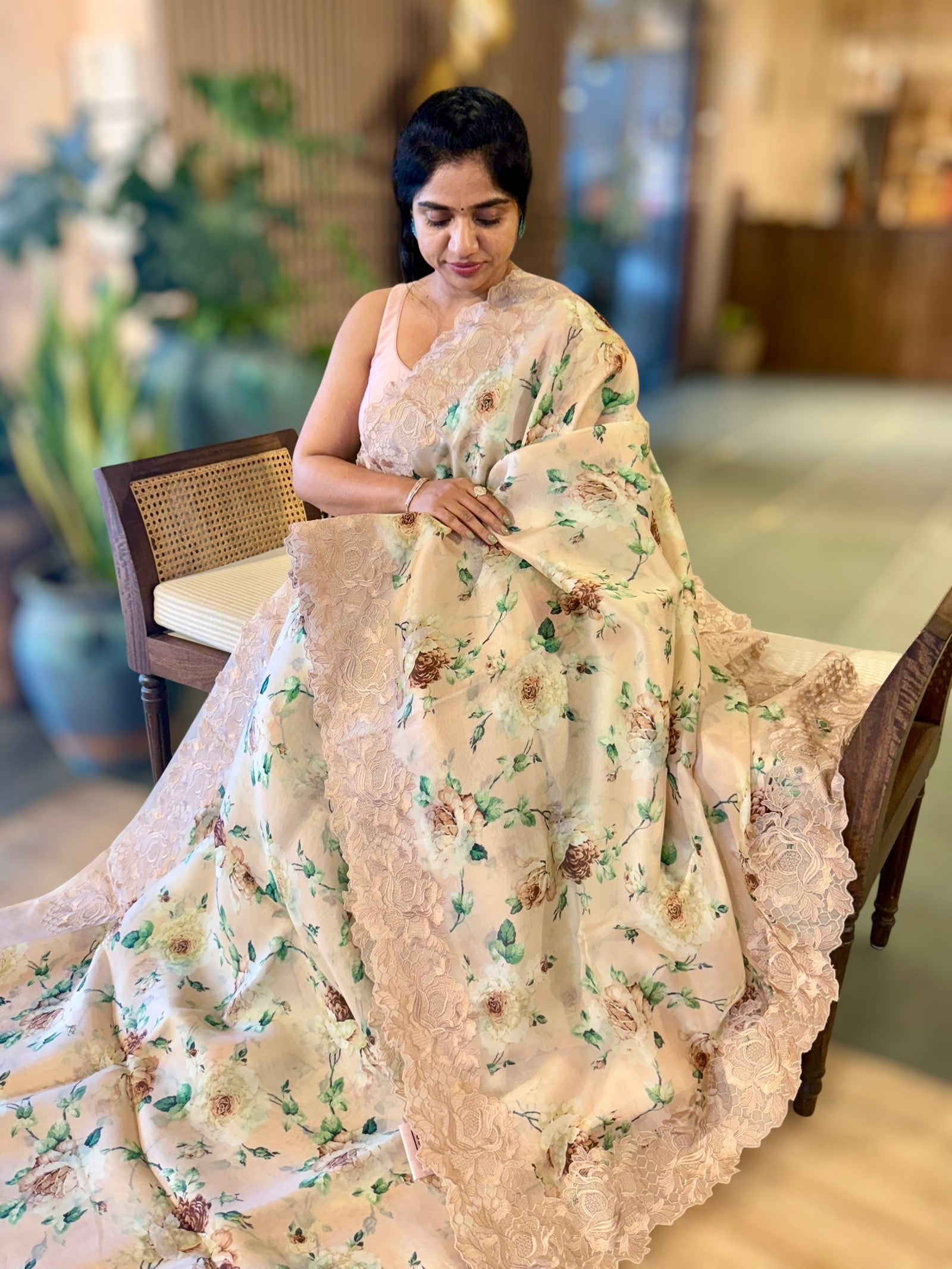 Nude Printed Organza Saree With Chantilly Lace Style Embroidered Border.