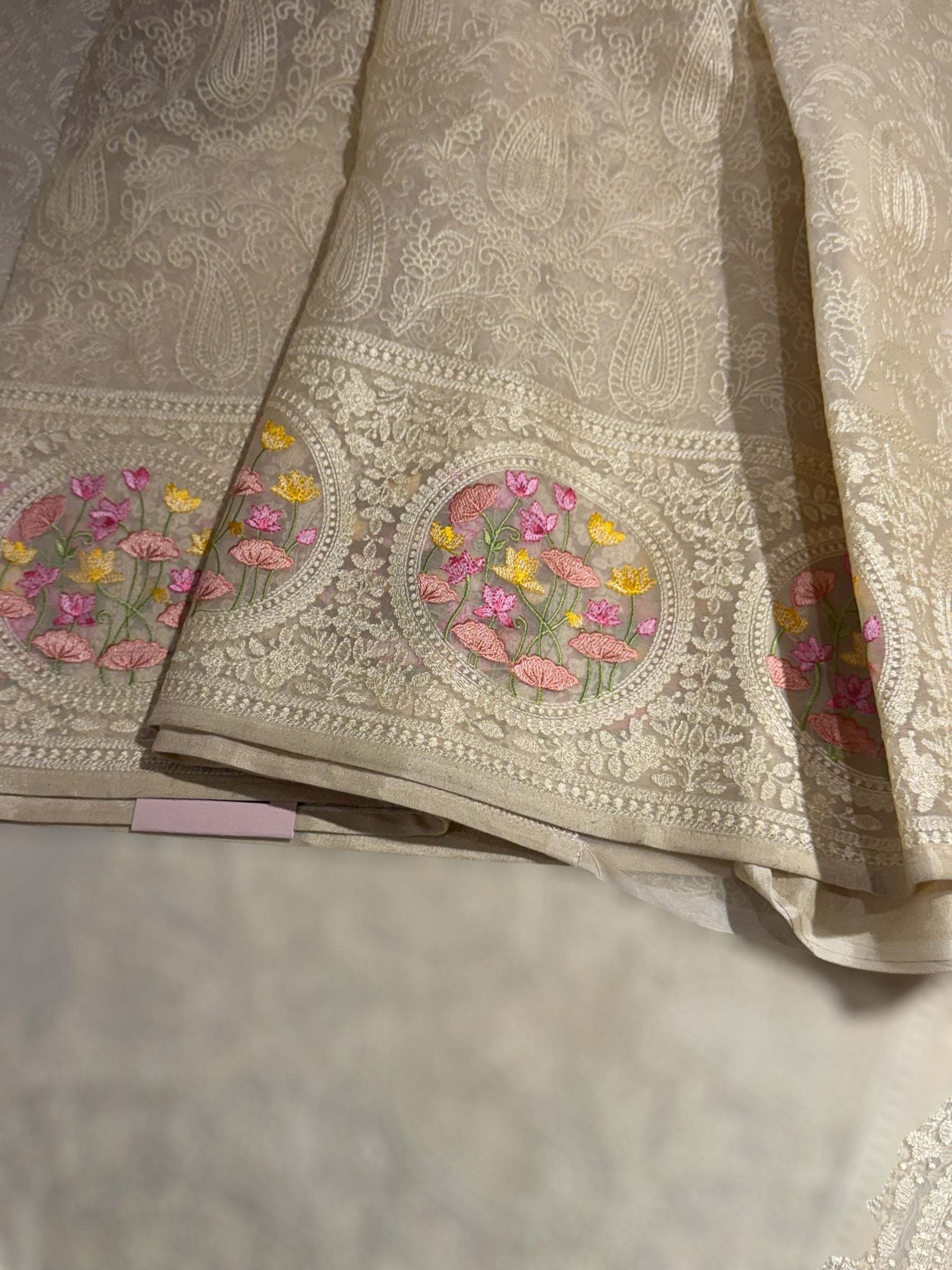 Ivory Organza Saree with allover Chikankari Embroidery and pichwai border