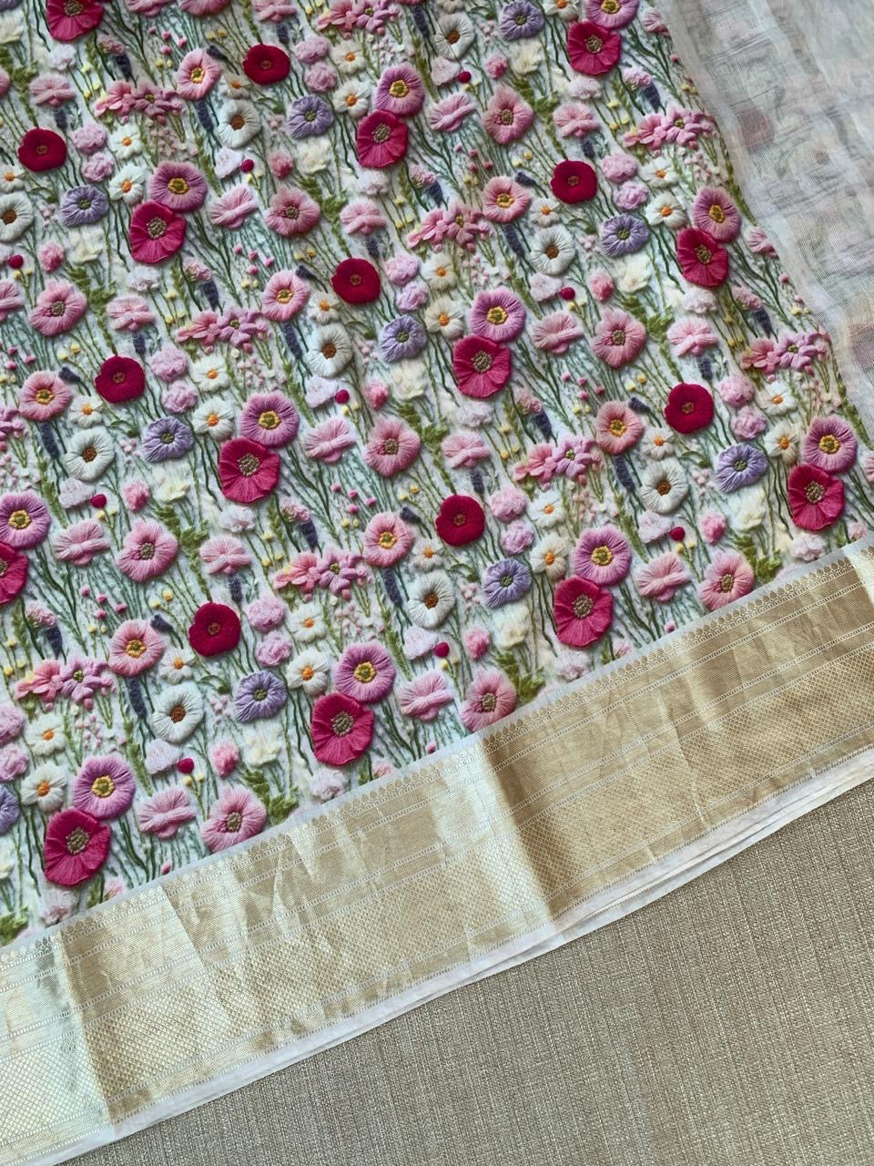 Ivory Pure Handloom Chiniya Silk Saree with stunning Floral Print and zari borders