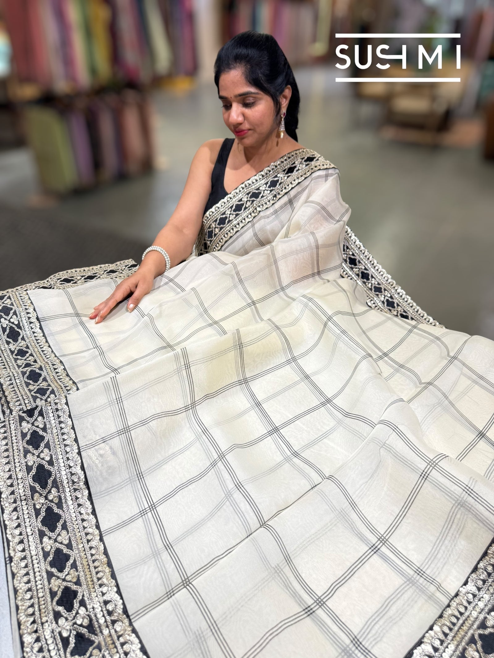 Ivory checks Organza with Sabhya inspired borders : S62F068