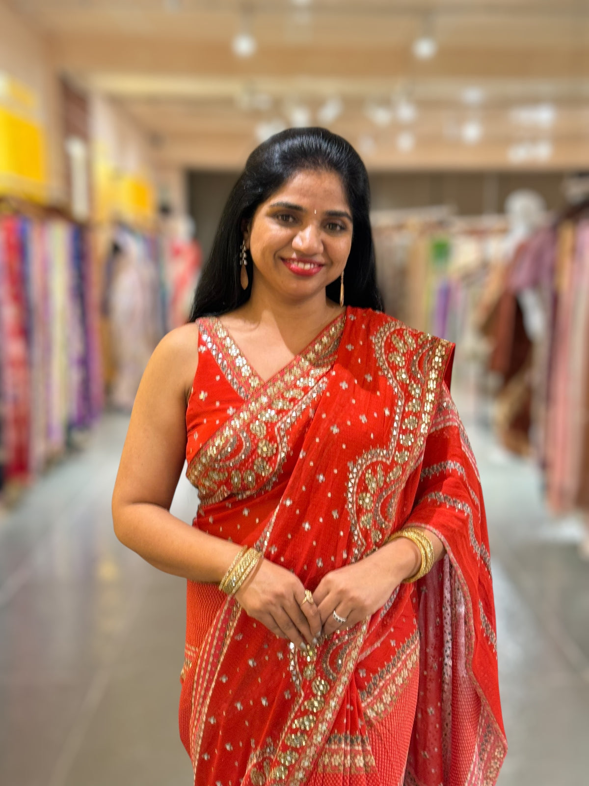 Orangish Red Kareena Inspired Gorgette Saree with allover mirrors