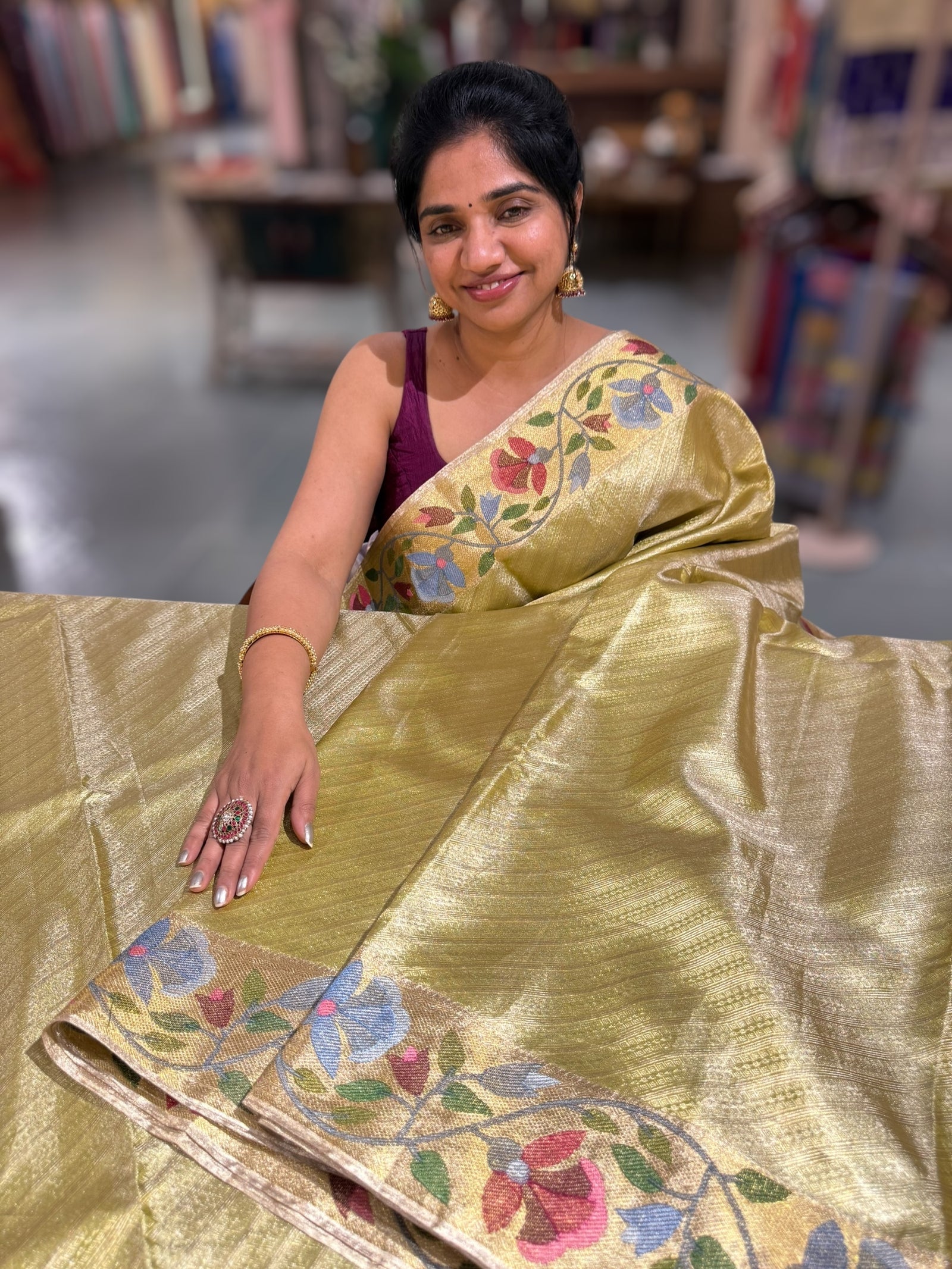 Apple Green Kanchi Tissue Brocade Saree With jamdani inspired embroidery.