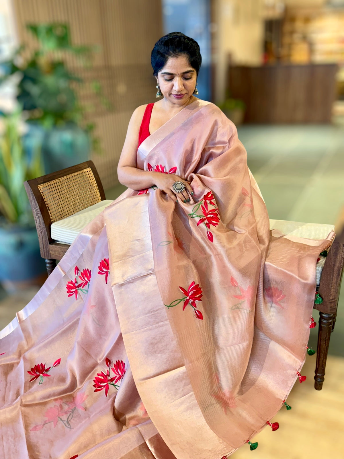 Onion Pink Organza Saree with Lotus flower embroidery and Satin Borders.