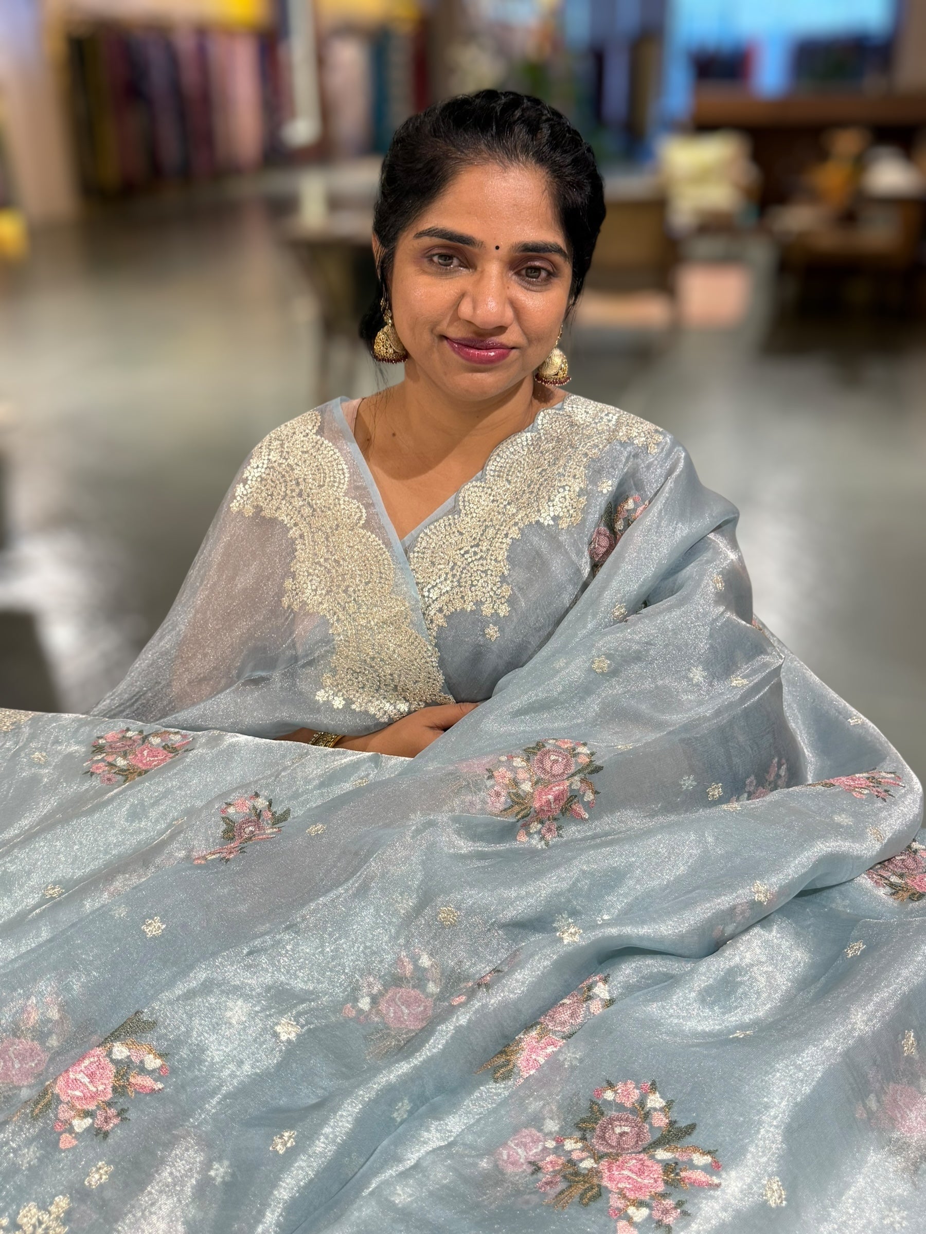 Pastel Blue Tissue Saree With allover Petite Point Motifs & Pittai Sequence Borders