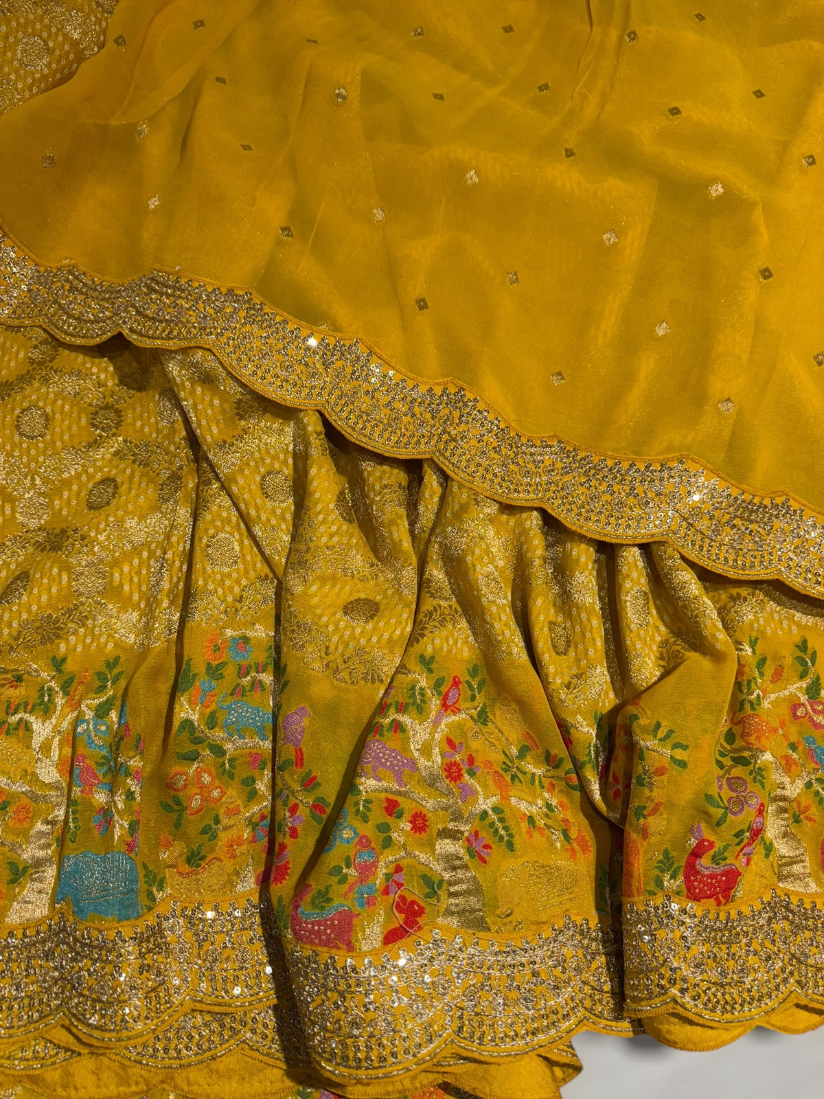 Yellow Bandhini Georgette Saree with sabya style scallop border