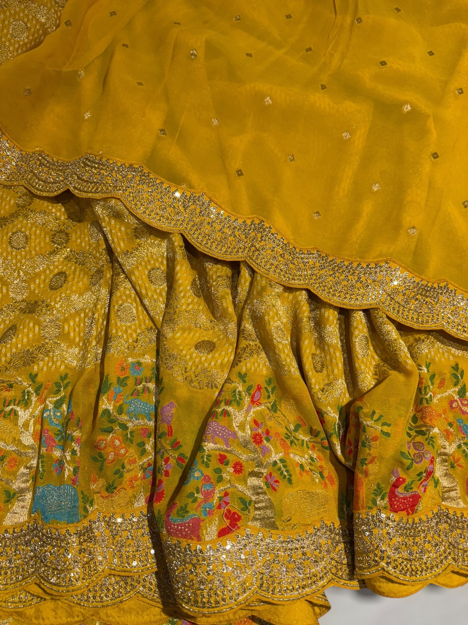 Yellow Bandhini Georgette Saree with sabya style scallop border