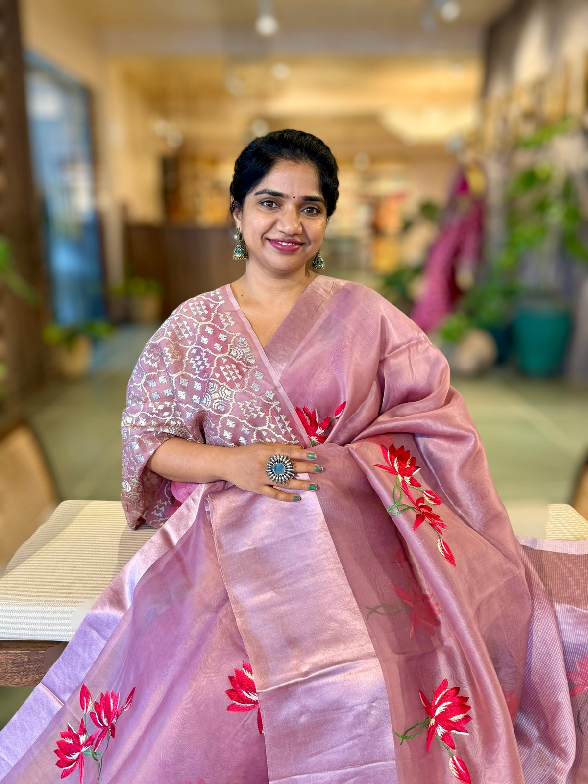 Mauve Organza Saree with Lotus flower embroidery and Satin Borders.