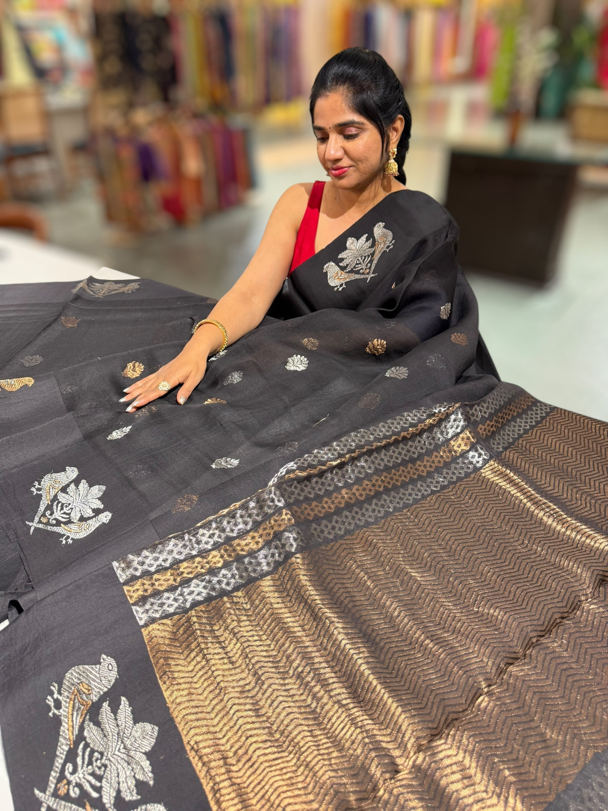 Black kora muslin sarees with kaduwa woven nandi motif border