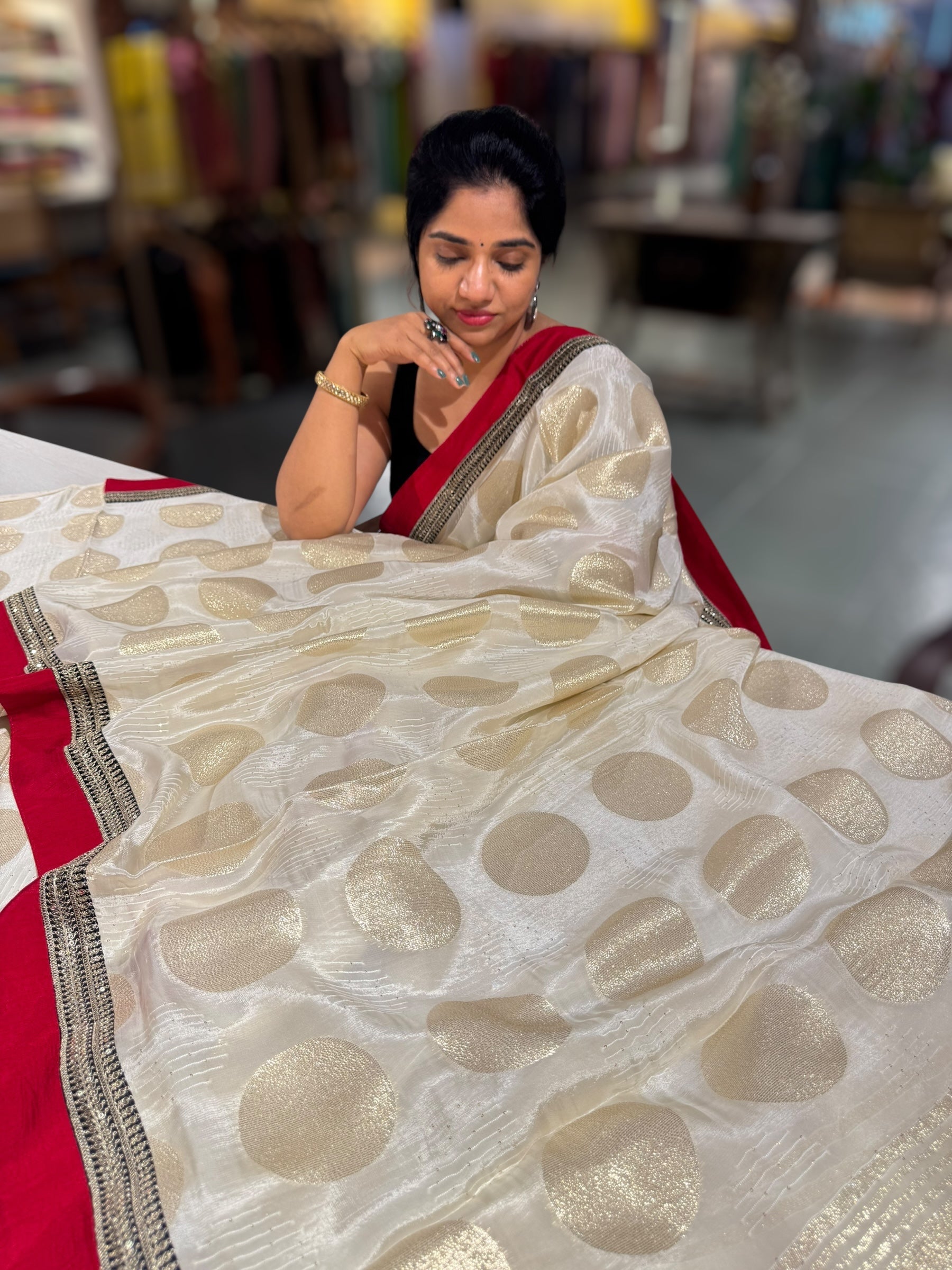 Half white Crepe Silk Polka dot Saree with sabhyasachi Borders & Blouse