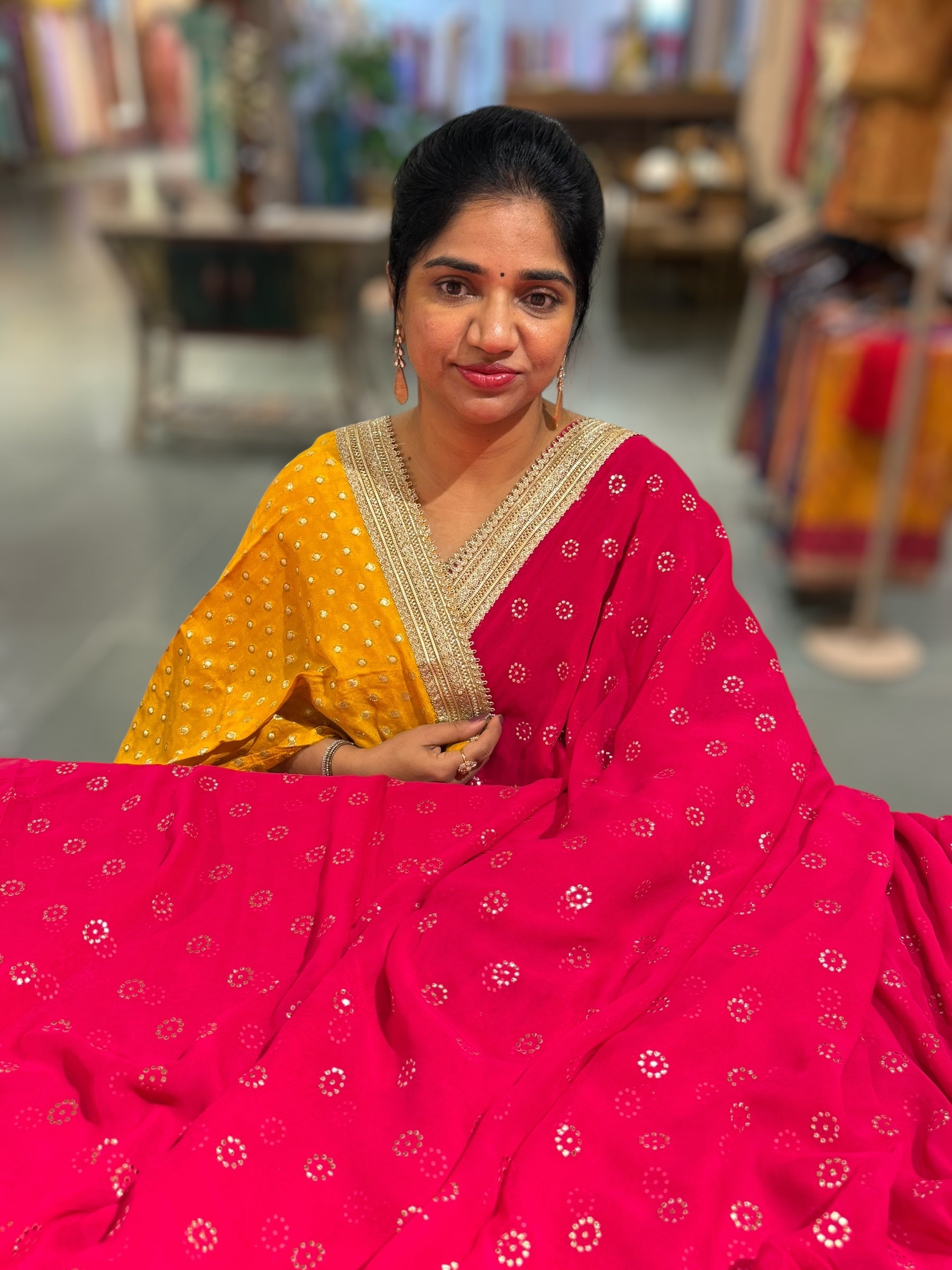 Dark Pink Georgette Saree with stick on Badla in flower pattern