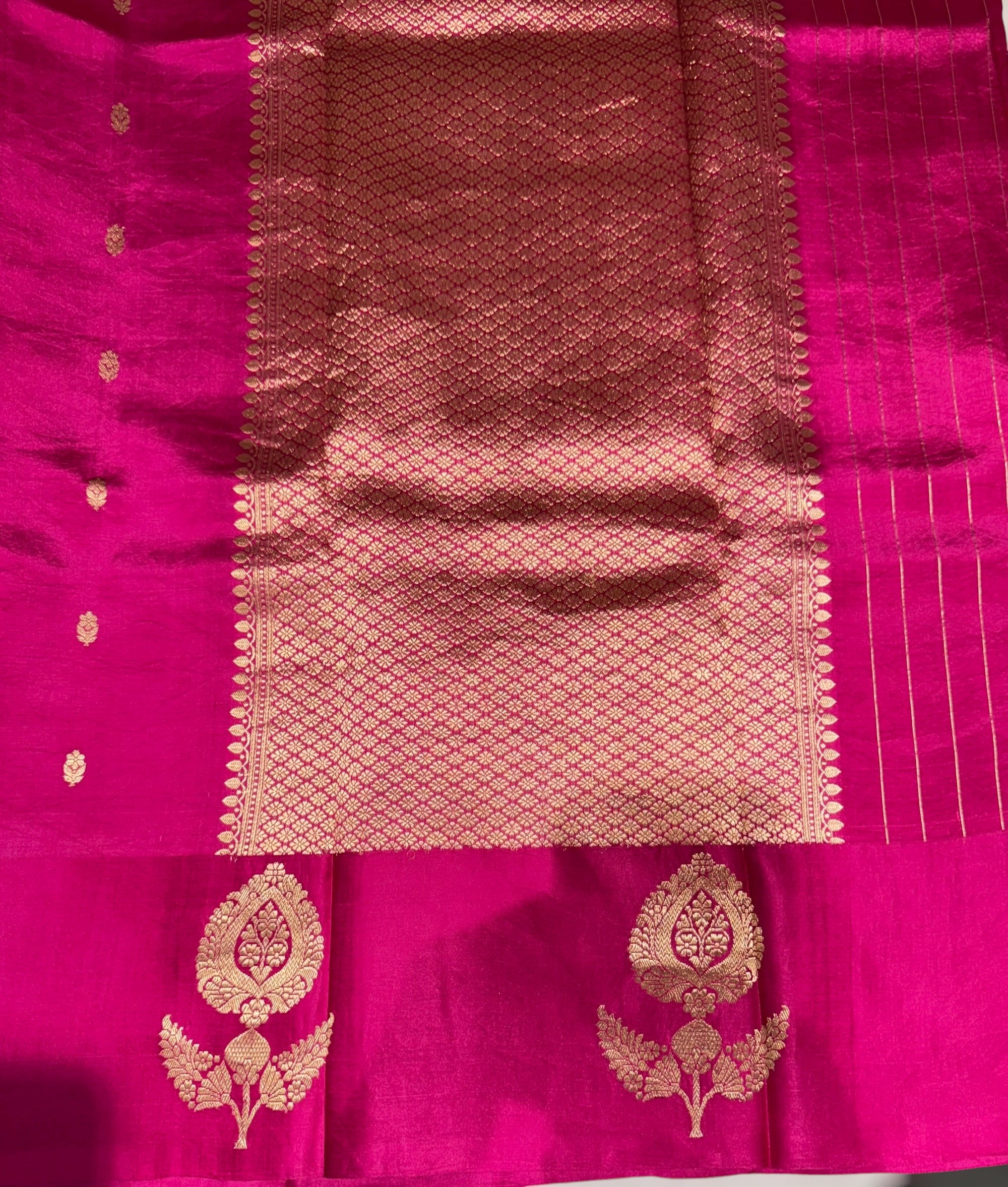 Rani Pink Raw Mangoe Silk Saree with kaduwa woven Motifs on Mashru Borders