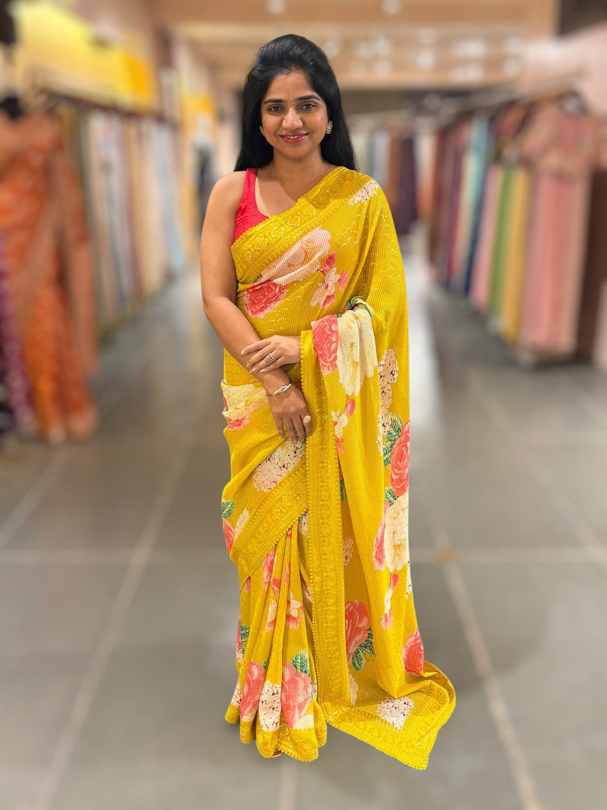 Yellow georgette sequence saree with statement floral print