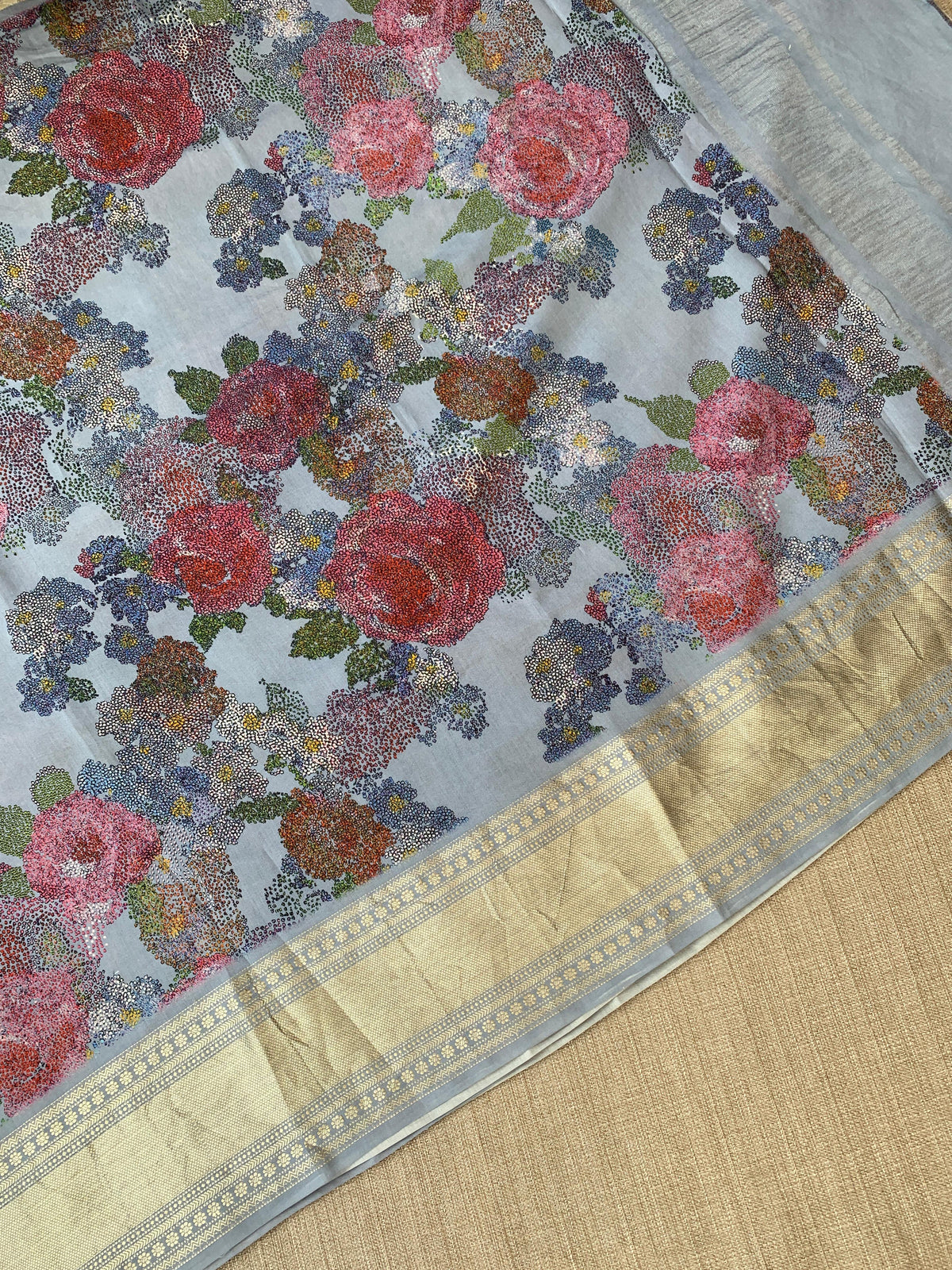 Dusty Blue Pure Handloom Chiniya Silk Saree with stunning Floral Print and zari borders