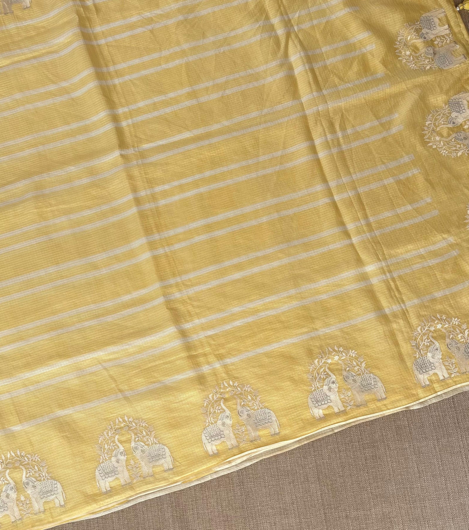 Pastel Yellow Designer Silk kota saree with elephant embroidered border