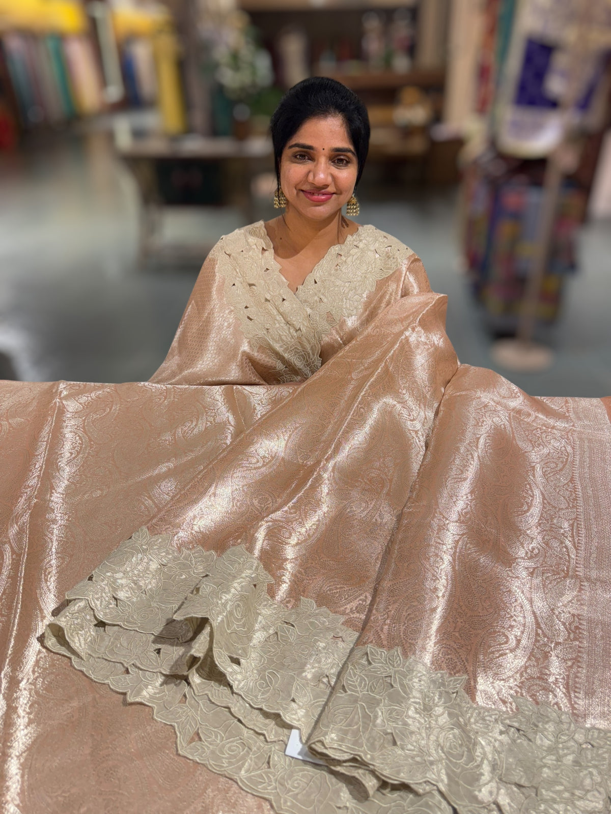 Peach Tissue Brocade allover weaving Saree with Tissue Cutwork Rose Border