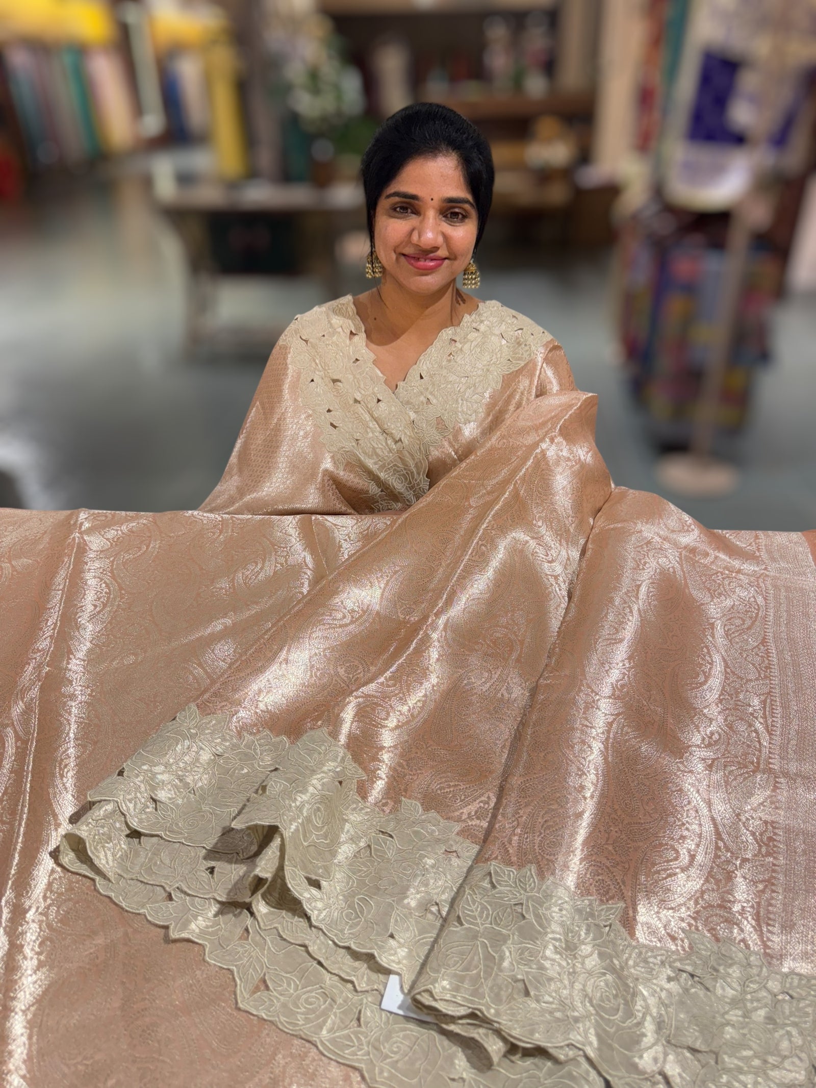 Peach Tissue Brocade allover weaving Saree with Tissue Cutwork Rose Border