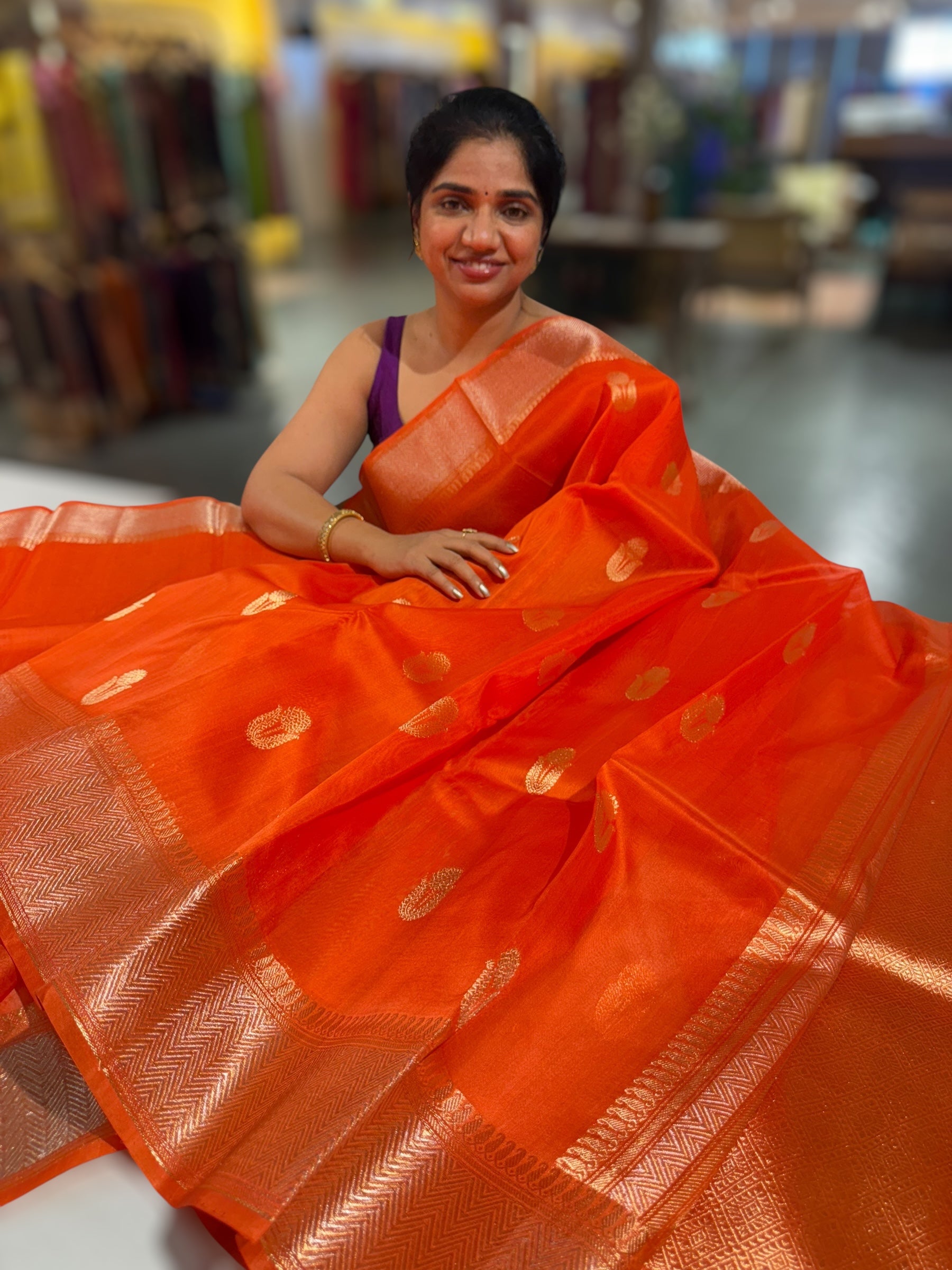 Orange Premium Kora Banarasi Saree with heavy weaving borders and Raw mango style motifs