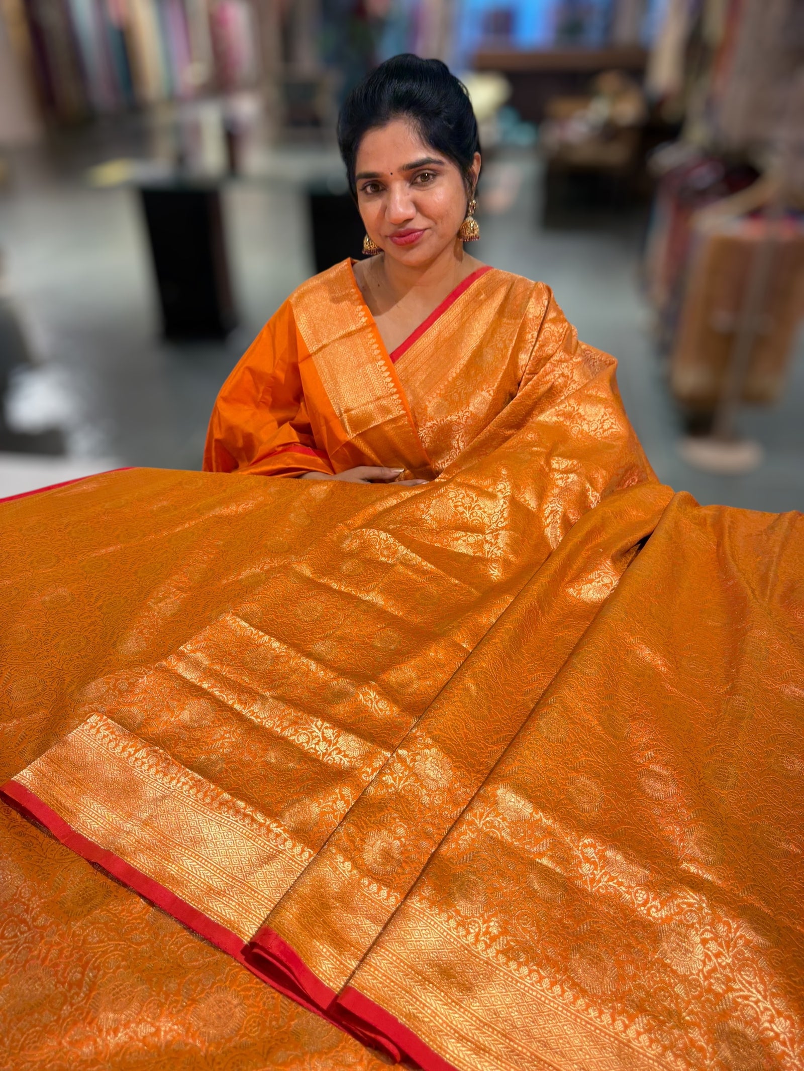 Orange Banarasi katan Tonchoi weaving Saree with red selvedge