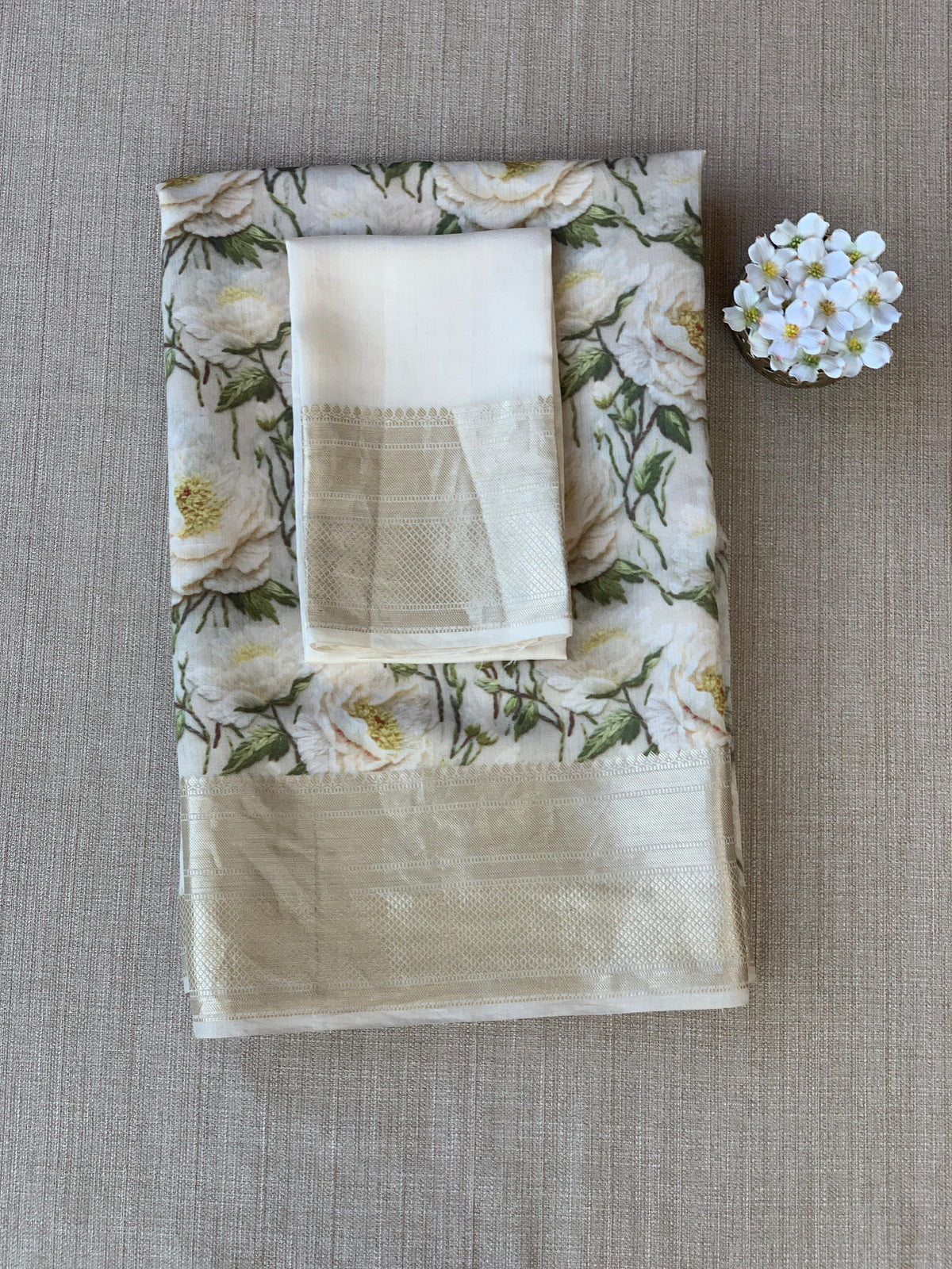 Ivory Pure Handloom Chiniya Silk Saree with stunning 3D Floral Print and zari borders