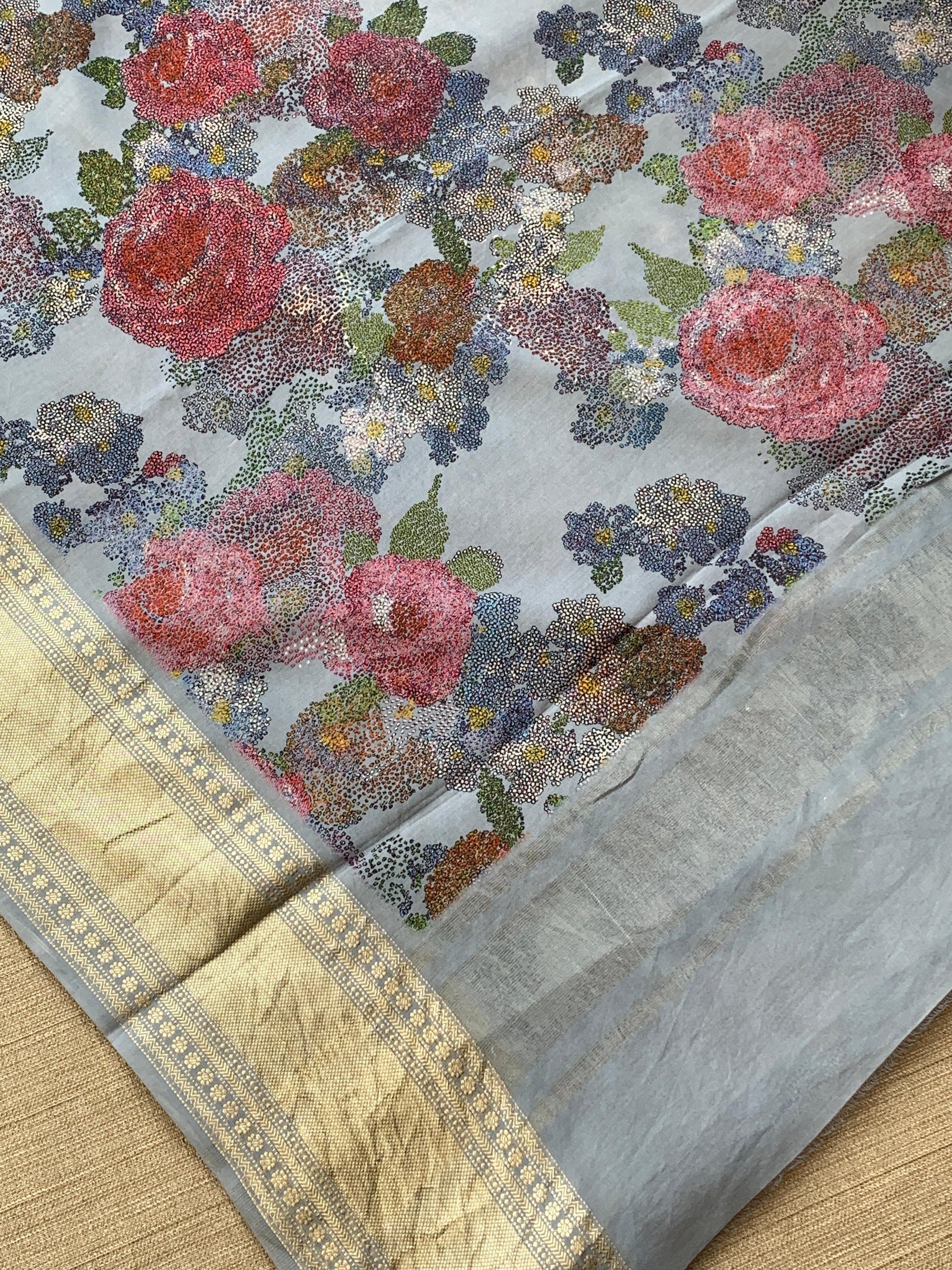 Dusty Blue Pure Handloom Chiniya Silk Saree with stunning Floral Print and zari borders