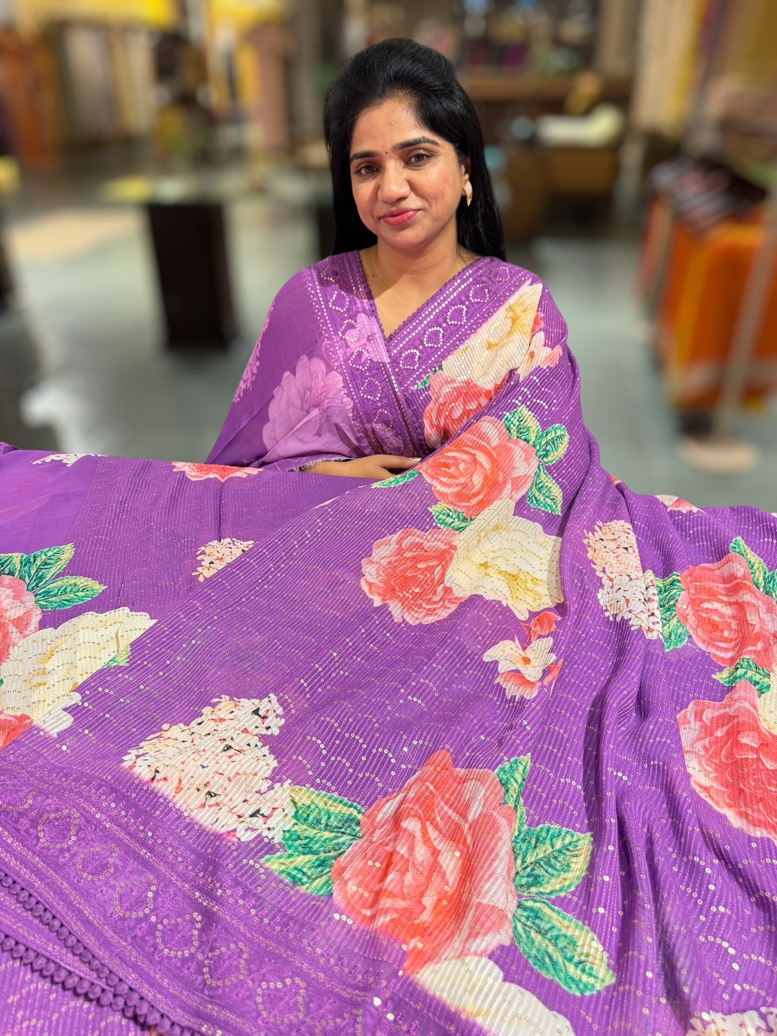Purple georgette sequence saree with statement floral print
